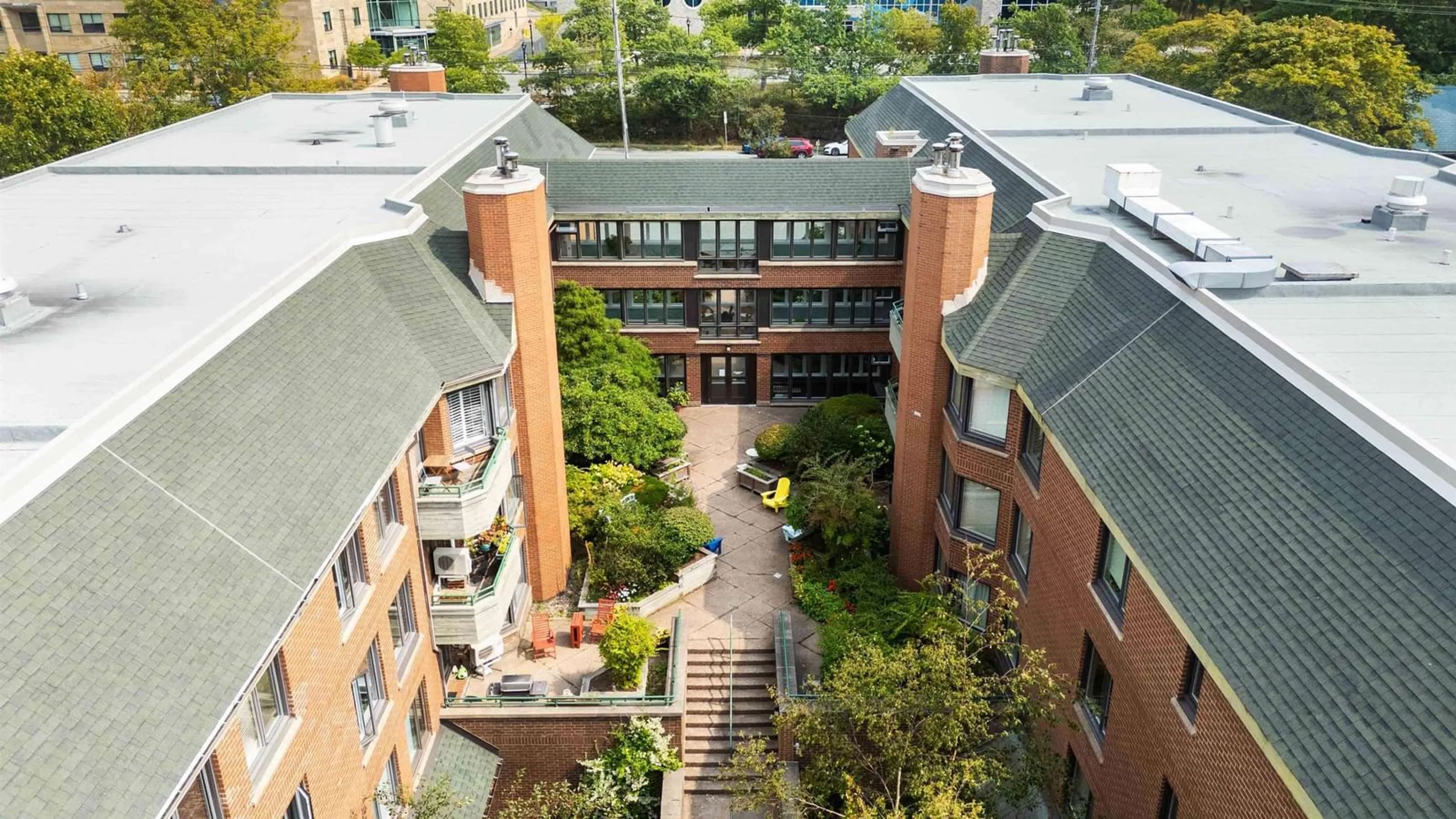 A pic from outside/outdoor area/front of a property/back of a property/a pic from drone, city buildings view from balcony for 1350 Oxford St #305, Halifax Nova Scotia B3H 3Y8