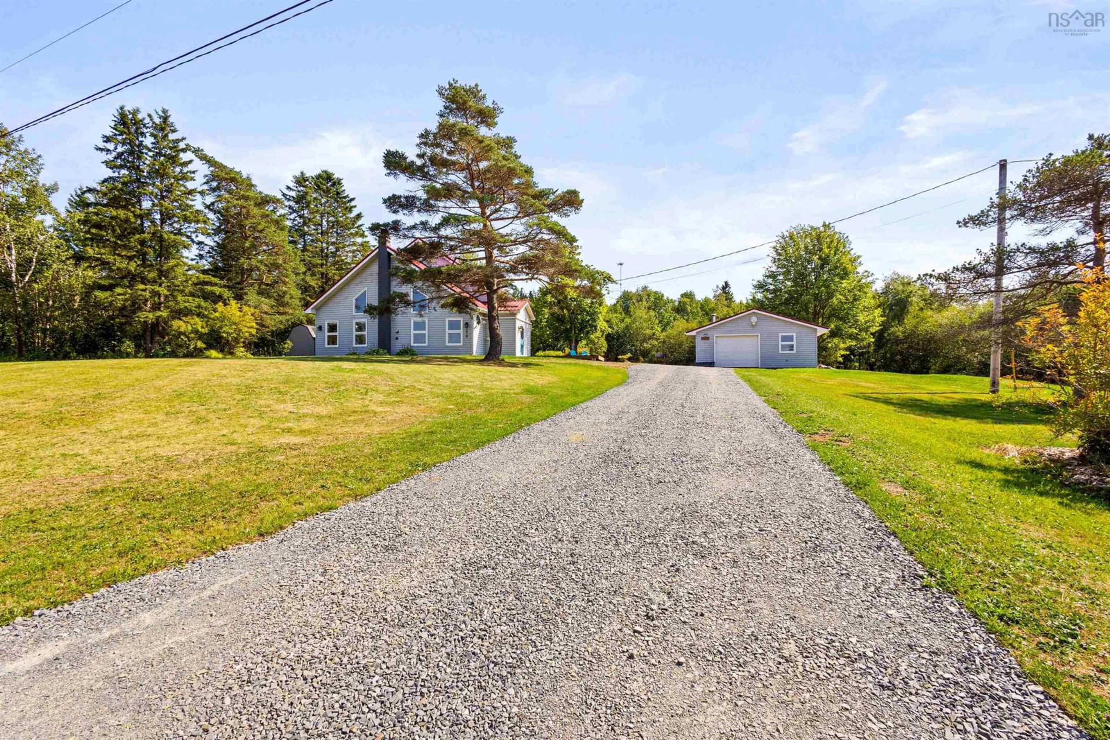 A pic from outside/outdoor area/front of a property/back of a property/a pic from drone, street for 320 Main St, Stewiacke Nova Scotia B0N 2J0