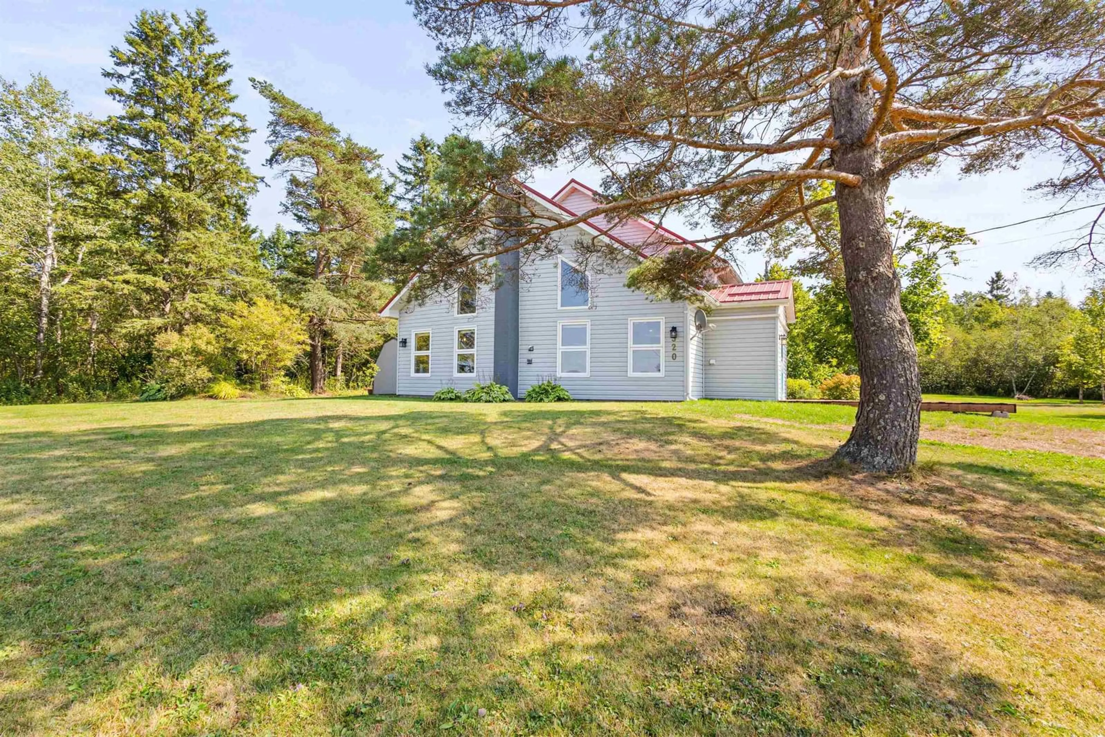 A pic from outside/outdoor area/front of a property/back of a property/a pic from drone, unknown for 320 Main St, Stewiacke Nova Scotia B0N 2J0