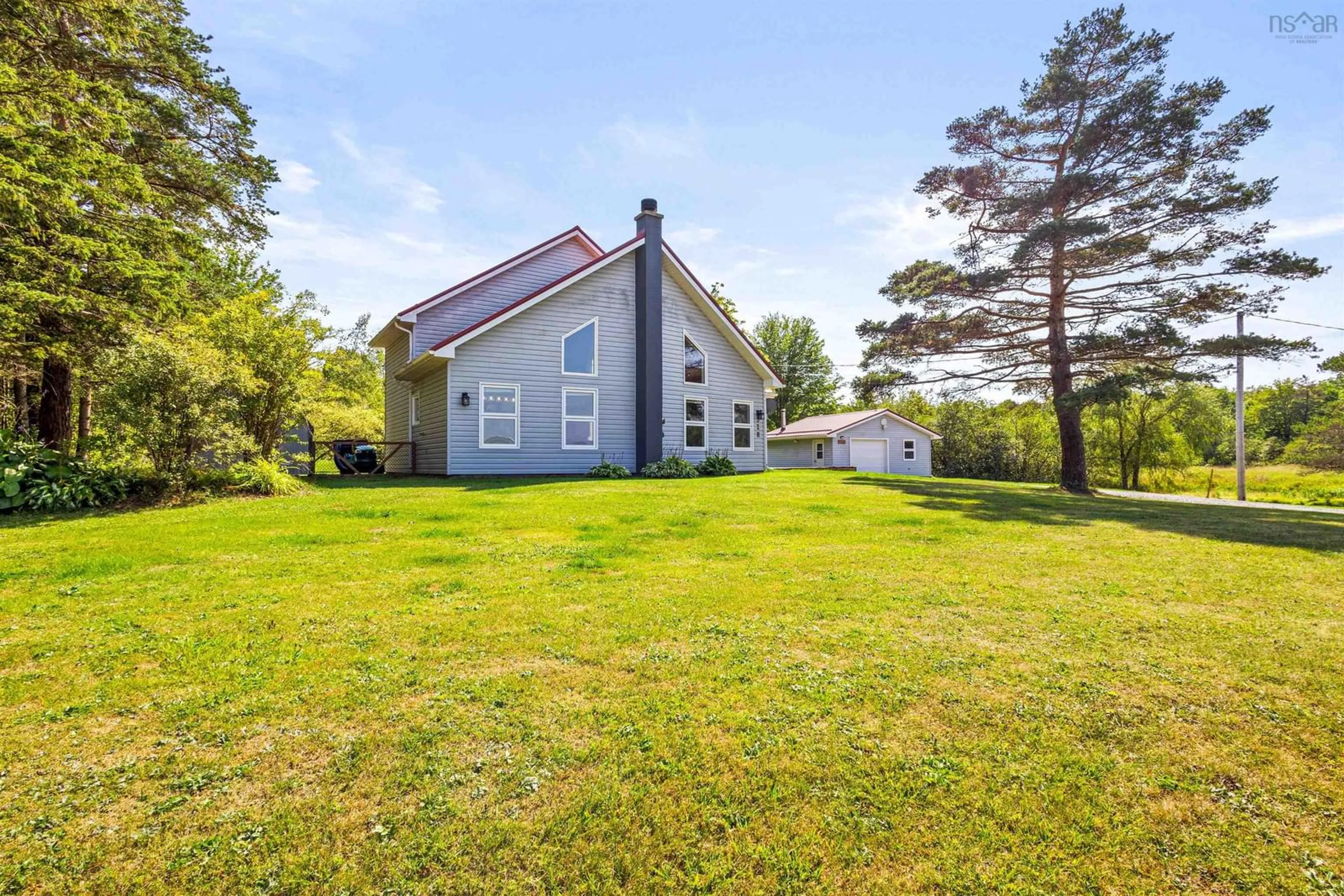 A pic from outside/outdoor area/front of a property/back of a property/a pic from drone, unknown for 320 Main St, Stewiacke Nova Scotia B0N 2J0