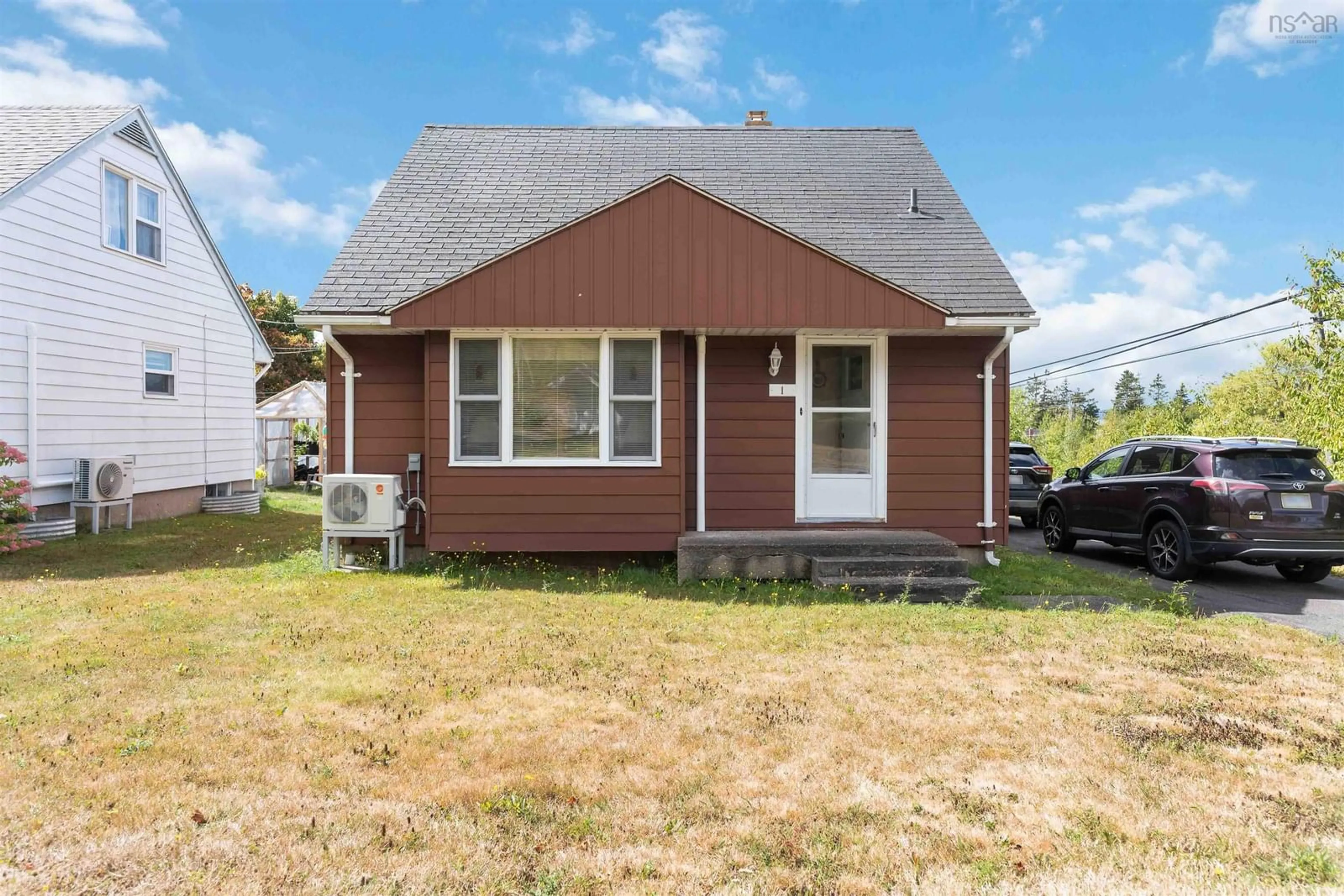 Home with vinyl exterior material, street for 1 Hillside Dr, Cornwallis Park Nova Scotia B0S 1H0