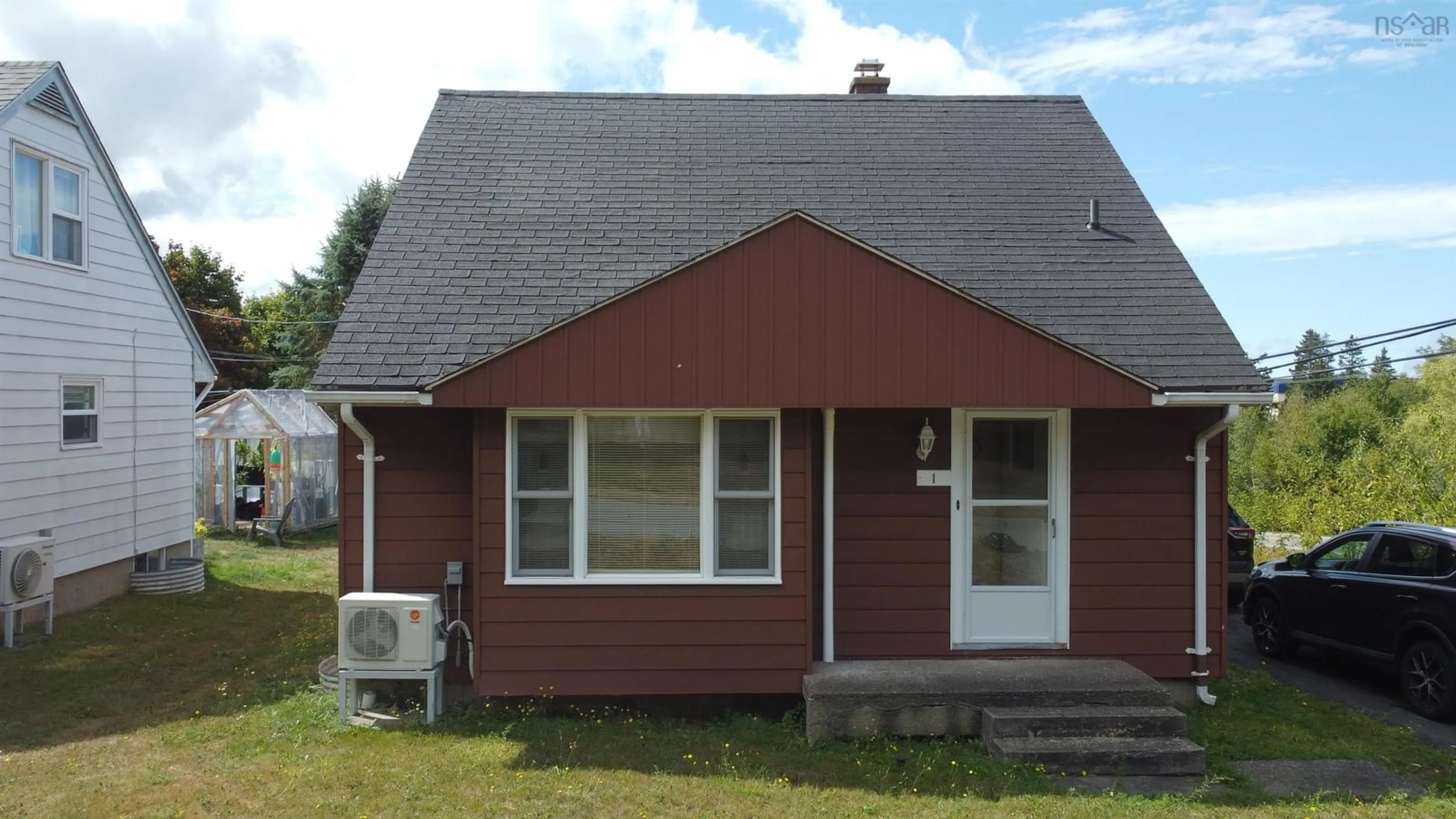 Home with vinyl exterior material, street for 1 Hillside Dr, Cornwallis Park Nova Scotia B0S 1H0