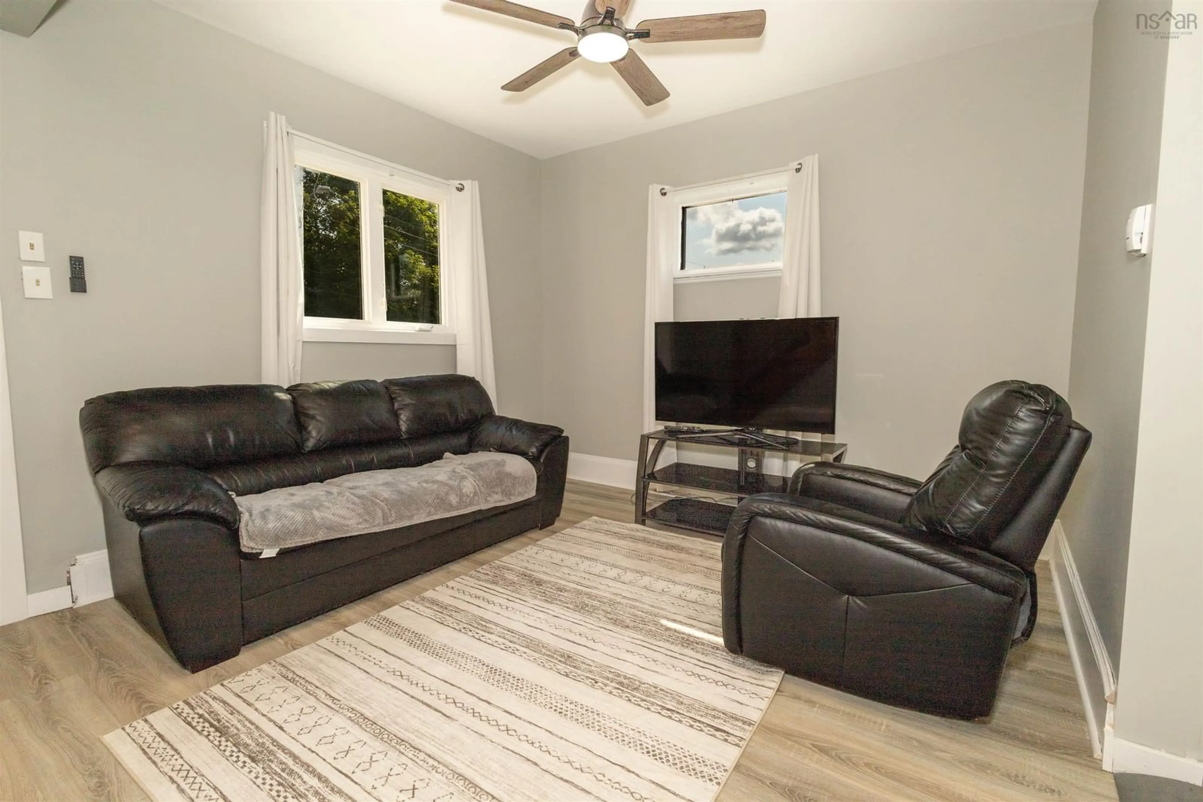 Living room with furniture, unknown for 192-194 Gatacre St, Sydney Nova Scotia B1N 1Z2