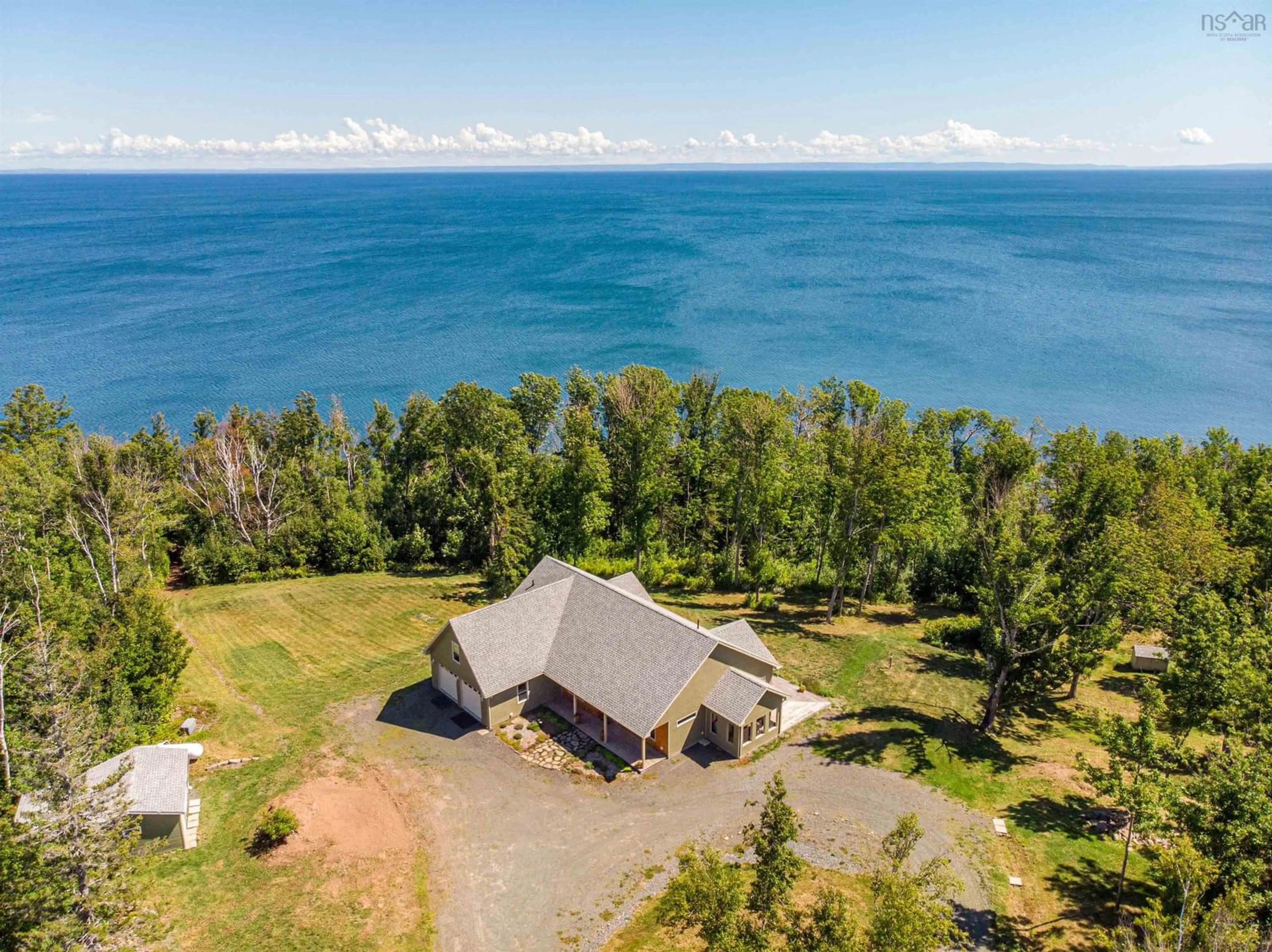 A pic from outside/outdoor area/front of a property/back of a property/a pic from drone, water/lake/river/ocean view for 5386 Highway 337, Cape George, Ant. Co., Cape George Nova Scotia B2G 2L2