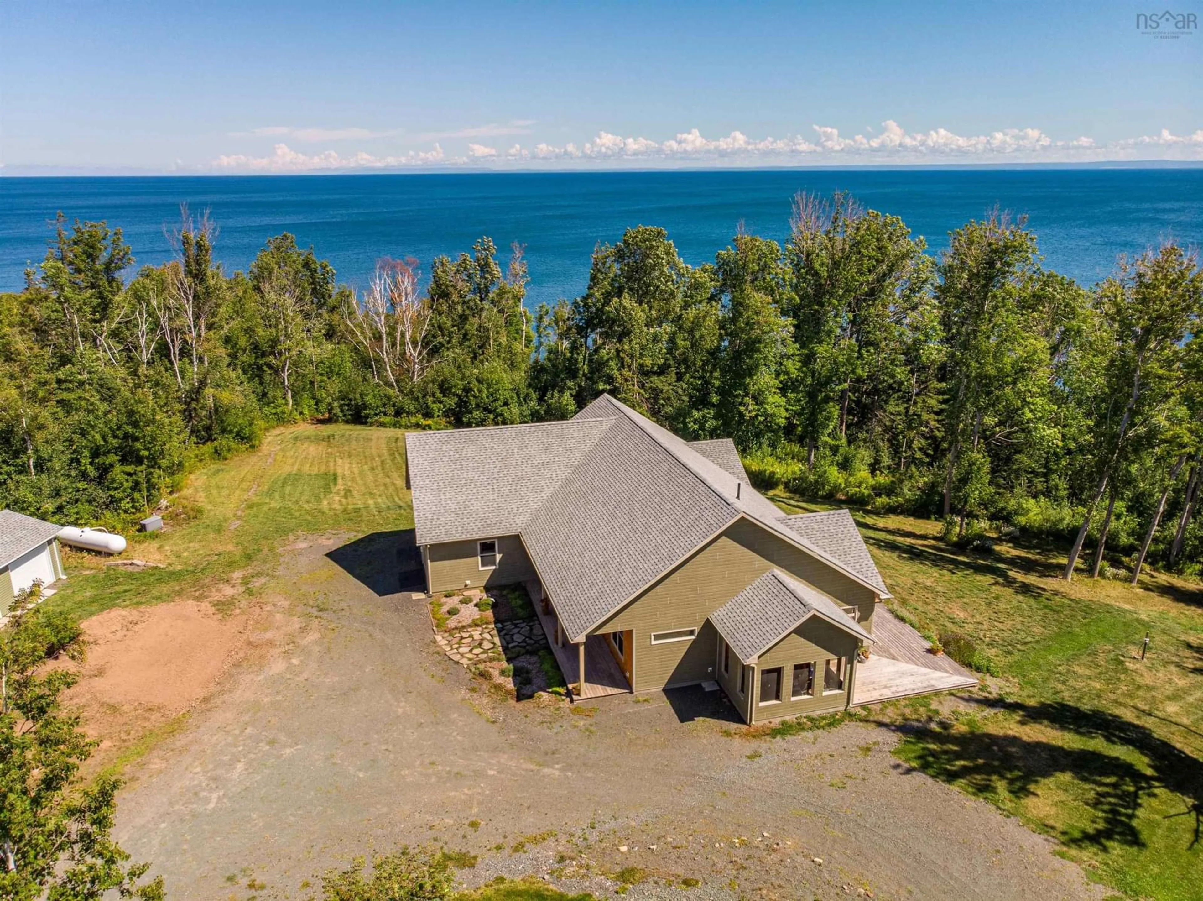A pic from outside/outdoor area/front of a property/back of a property/a pic from drone, water/lake/river/ocean view for 5386 Highway 337, Cape George, Ant. Co., Cape George Nova Scotia B2G 2L2