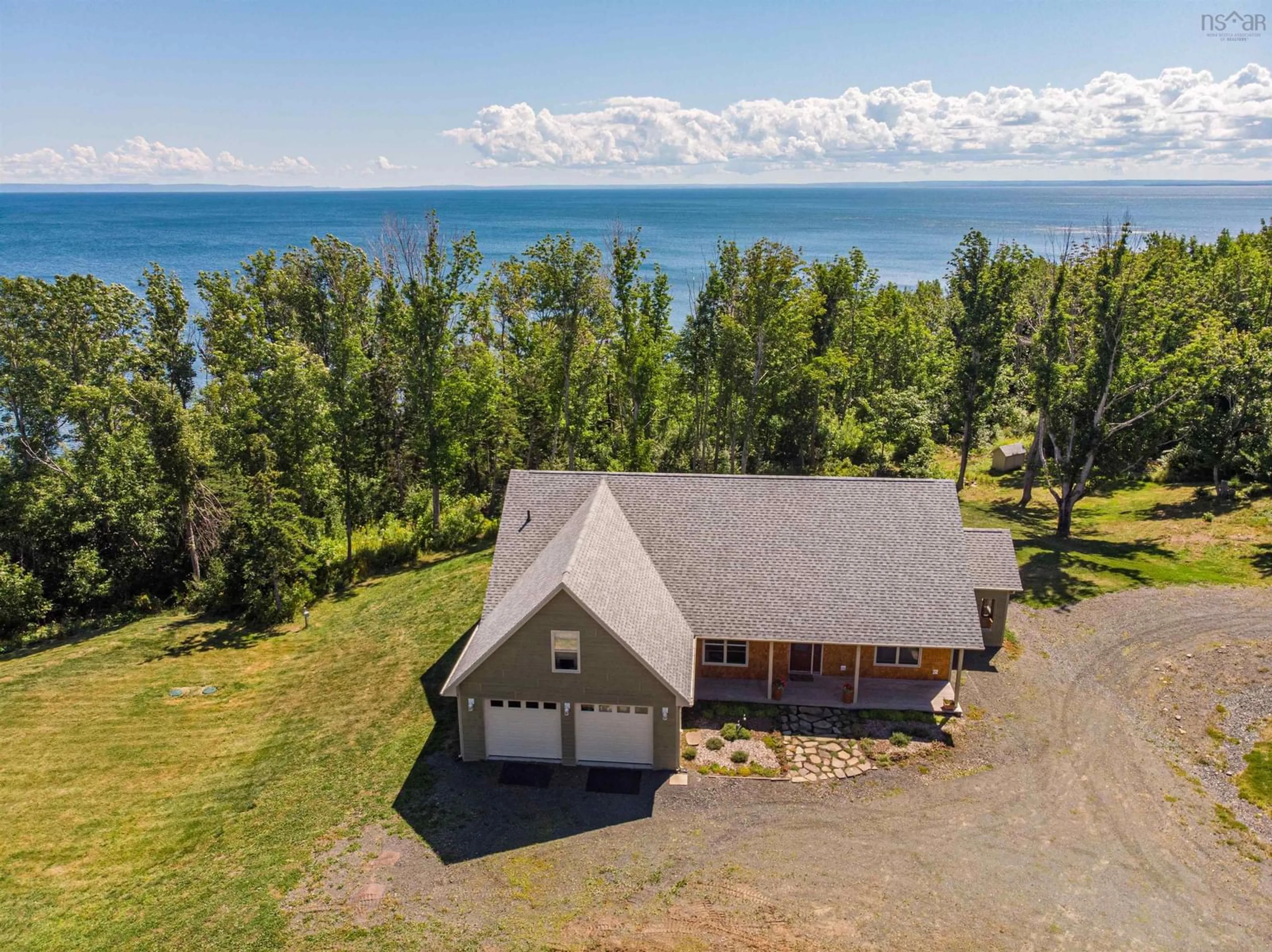 A pic from outside/outdoor area/front of a property/back of a property/a pic from drone, water/lake/river/ocean view for 5386 Highway 337, Cape George, Ant. Co., Cape George Nova Scotia B2G 2L2