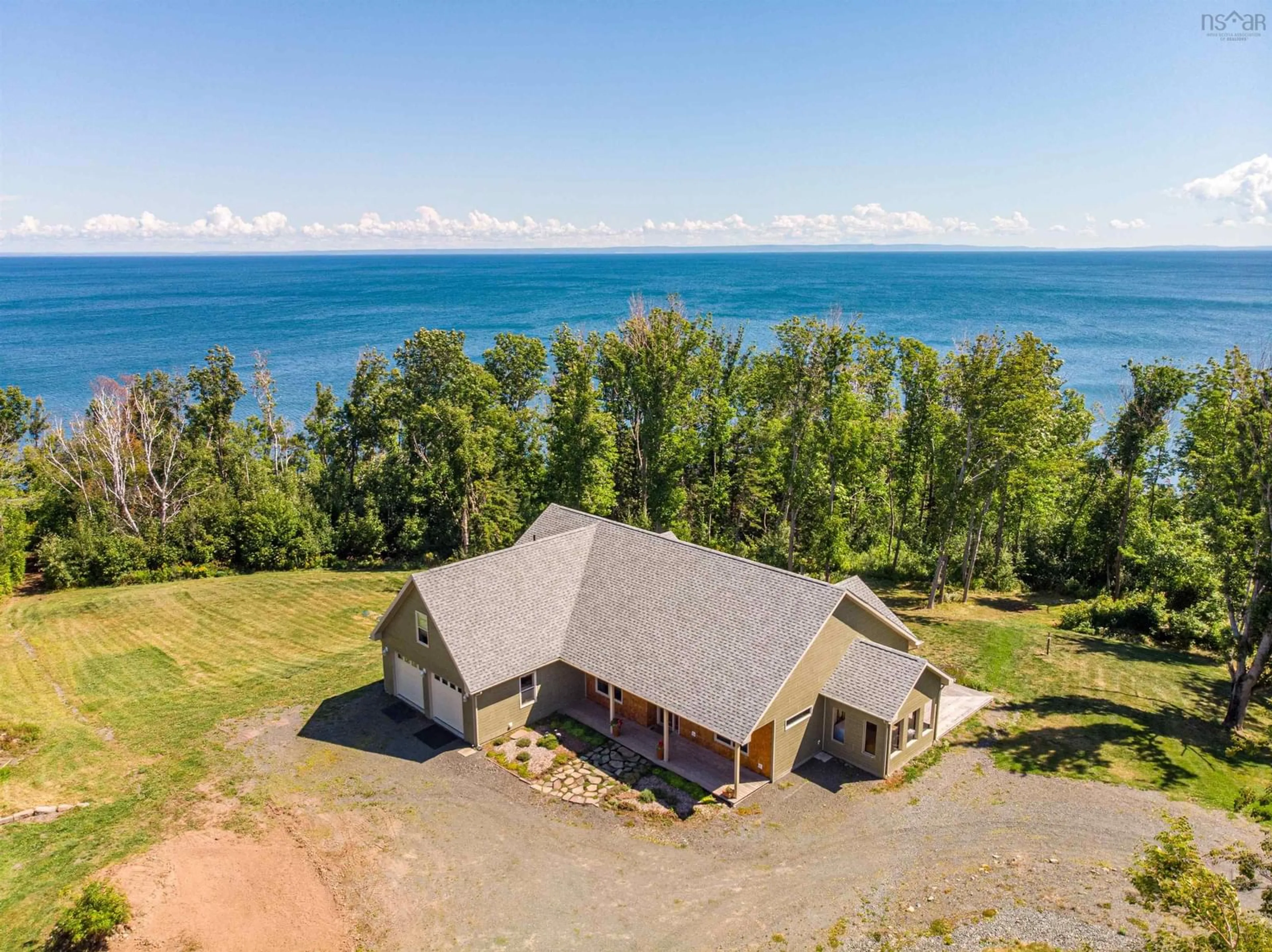 A pic from outside/outdoor area/front of a property/back of a property/a pic from drone, water/lake/river/ocean view for 5386 Highway 337, Cape George, Ant. Co., Cape George Nova Scotia B2G 2L2