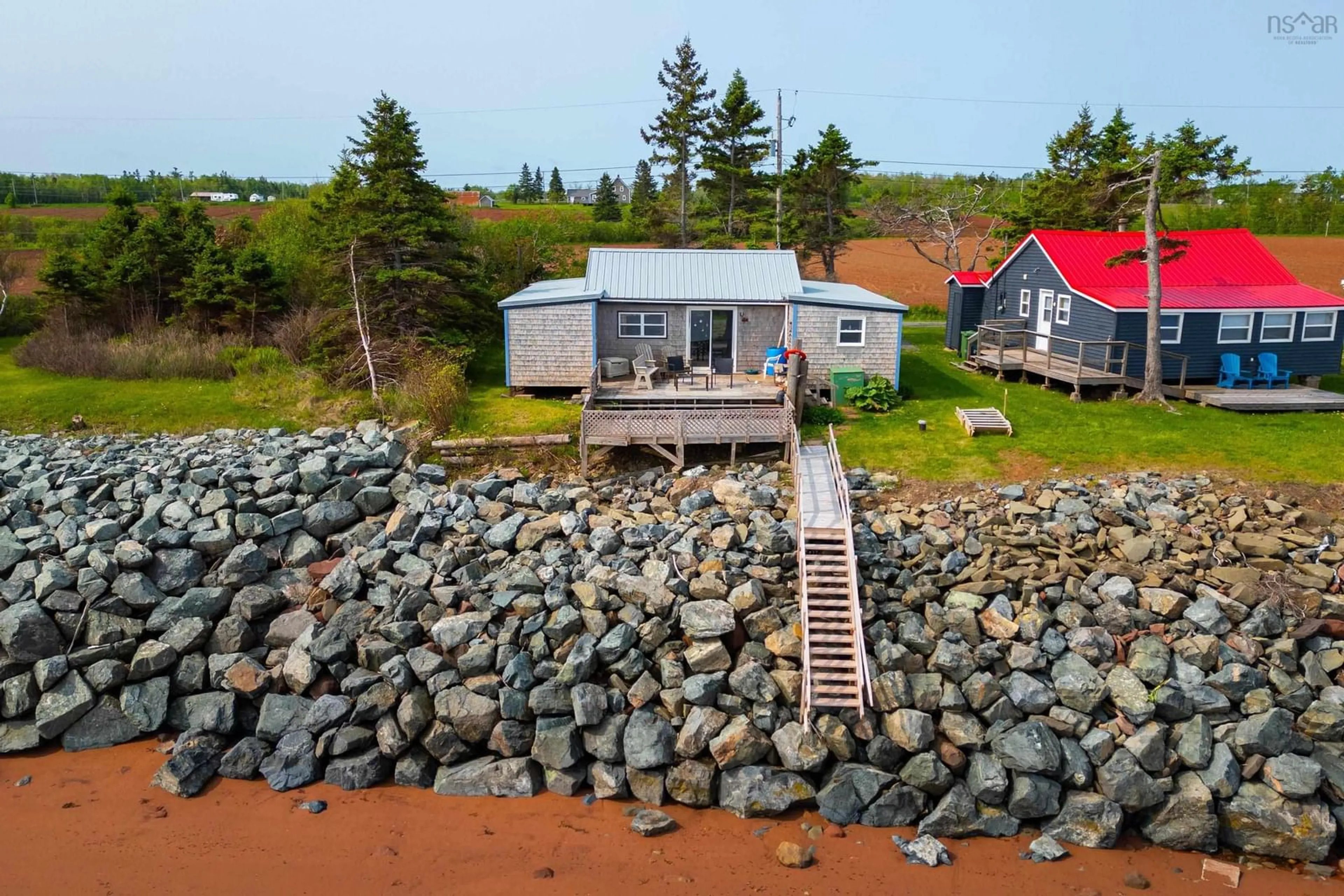A pic from outside/outdoor area/front of a property/back of a property/a pic from drone, water/lake/river/ocean view for 85 Ridgway Lane, Northport Nova Scotia B0L 0A3