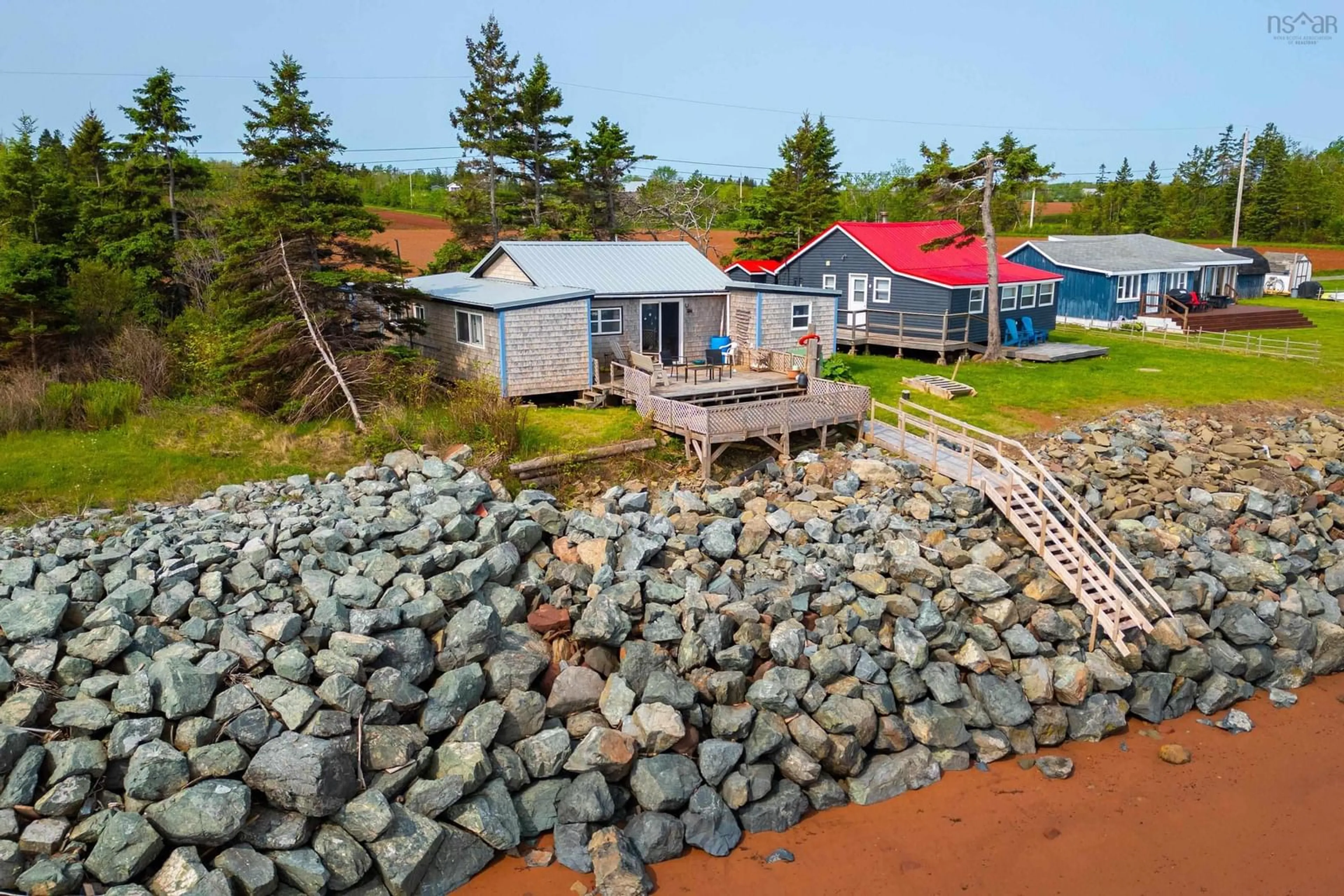 A pic from outside/outdoor area/front of a property/back of a property/a pic from drone, water/lake/river/ocean view for 85 Ridgway Lane, Northport Nova Scotia B0L 0A3