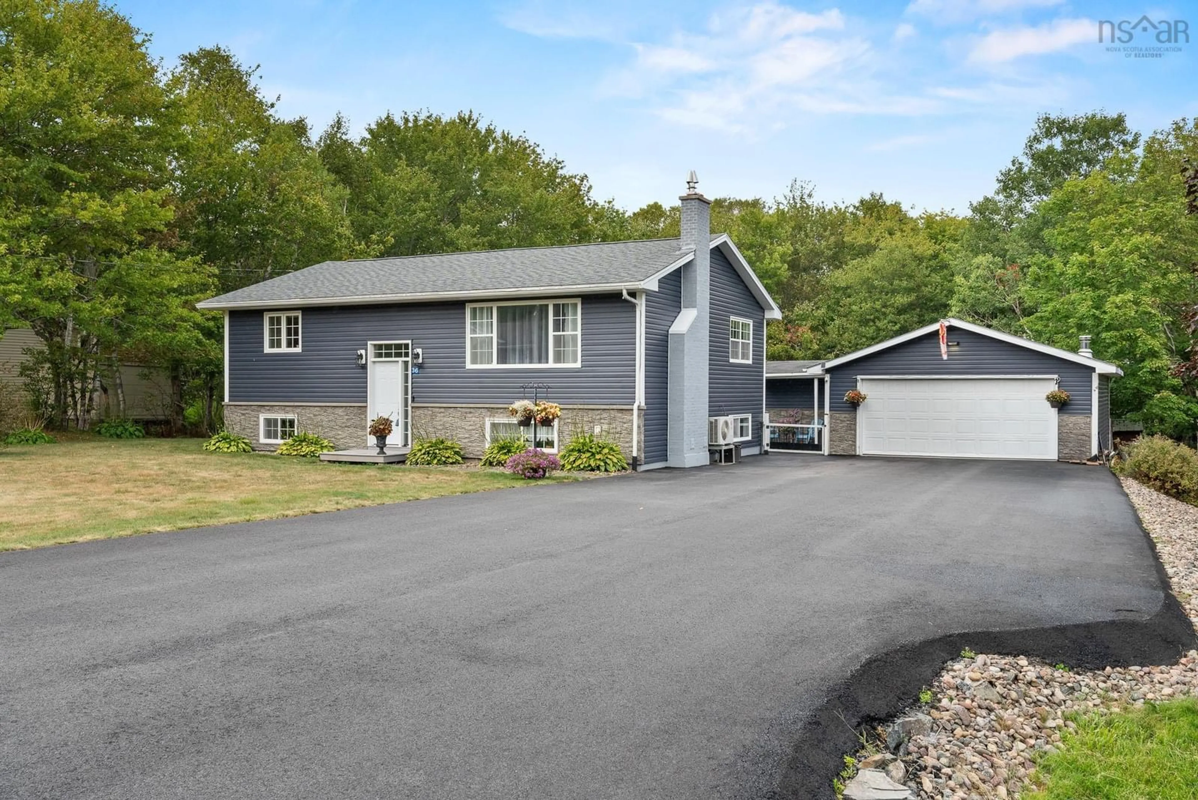 Home with vinyl exterior material, street for 36 Rockwell Dr, Mount Uniacke Nova Scotia B0N 1Z0