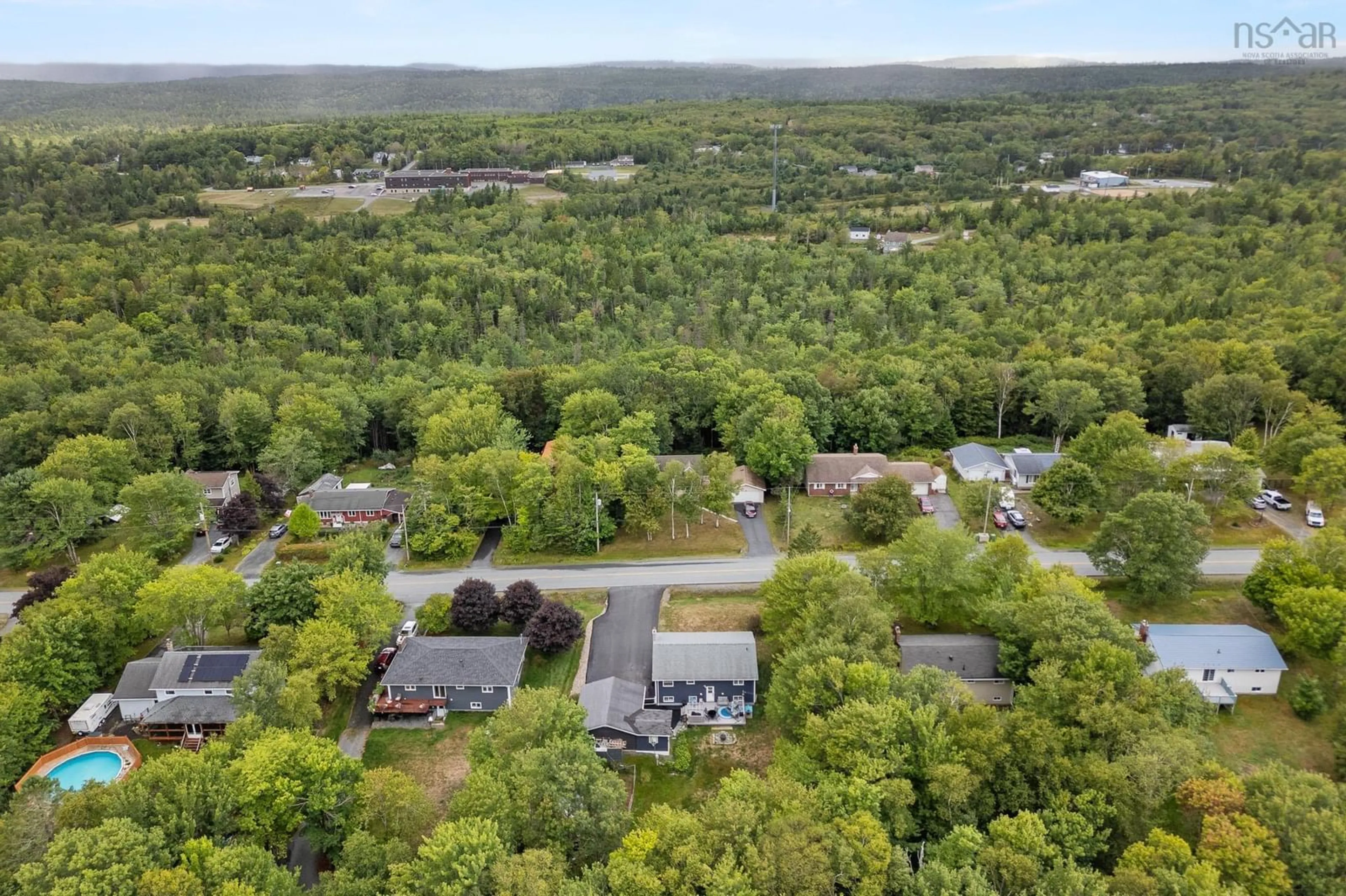 A pic from outside/outdoor area/front of a property/back of a property/a pic from drone, forest/trees view for 36 Rockwell Dr, Mount Uniacke Nova Scotia B0N 1Z0