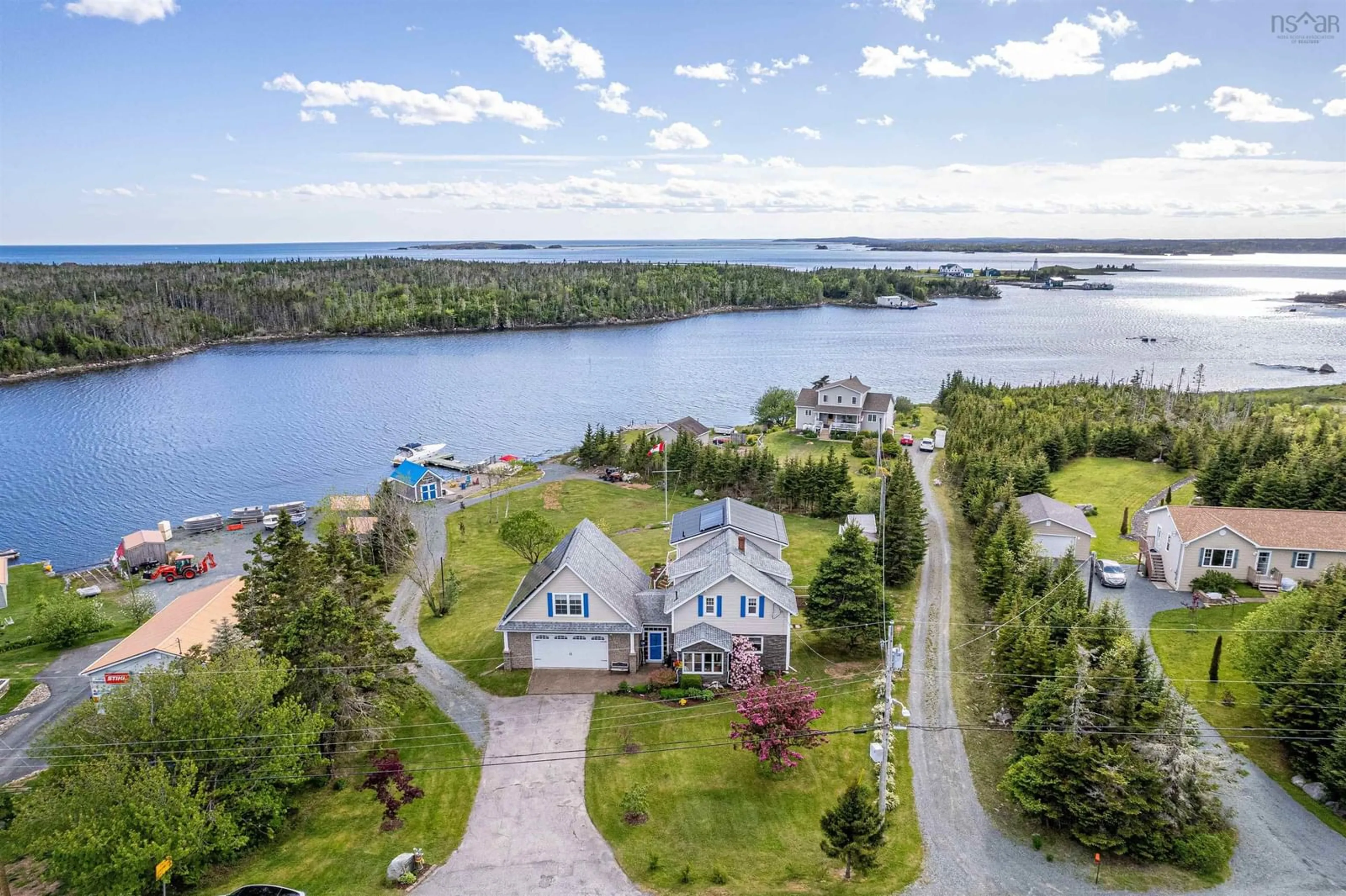 A pic from outside/outdoor area/front of a property/back of a property/a pic from drone, water/lake/river/ocean view for 2270 Ostrea Lake Rd, Ostrea Lake Nova Scotia B0J 2L0