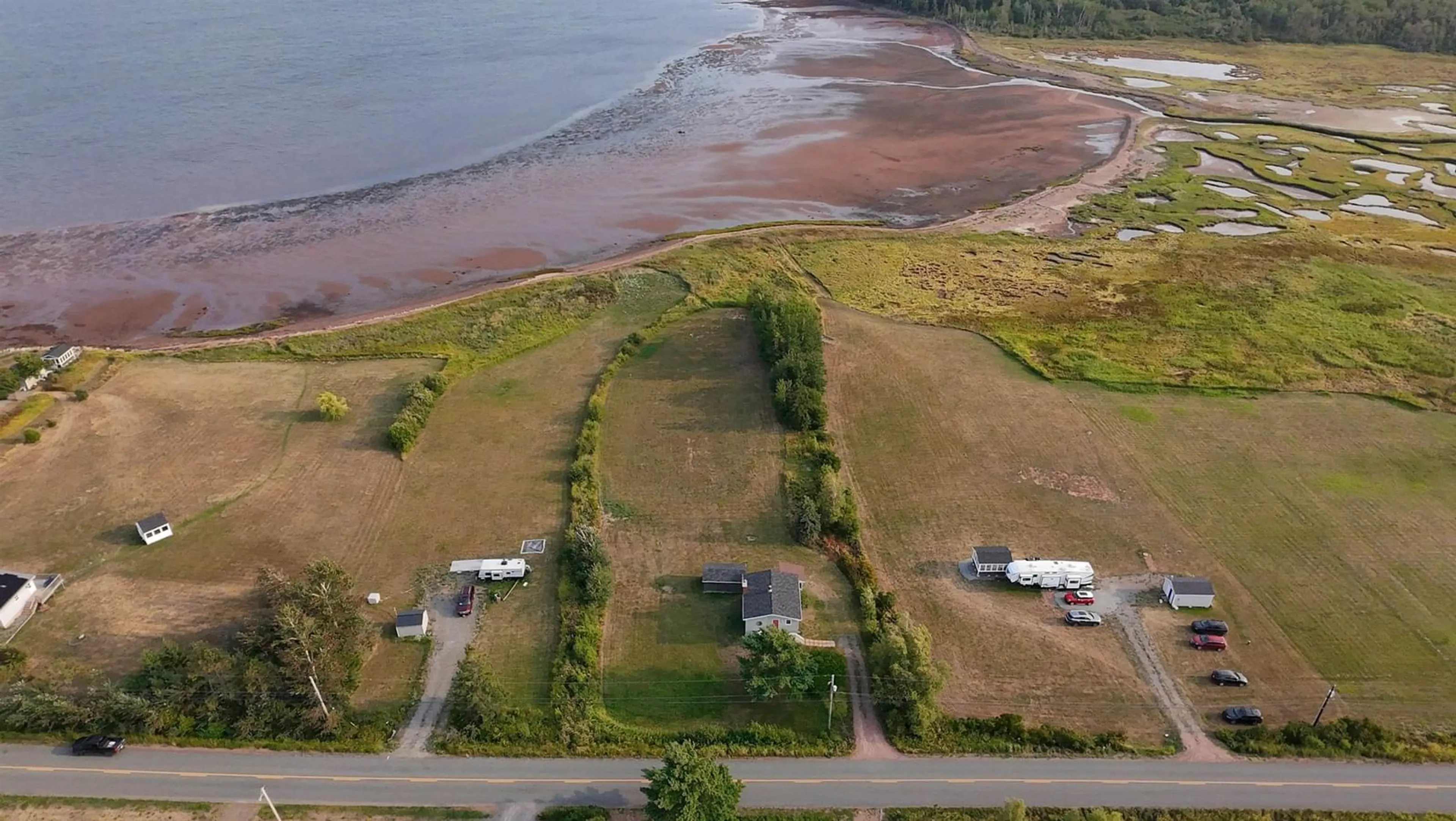 A pic from outside/outdoor area/front of a property/back of a property/a pic from drone, water/lake/river/ocean view for 2884 Malagash Rd, Malagash Centre Nova Scotia B0K 1E0