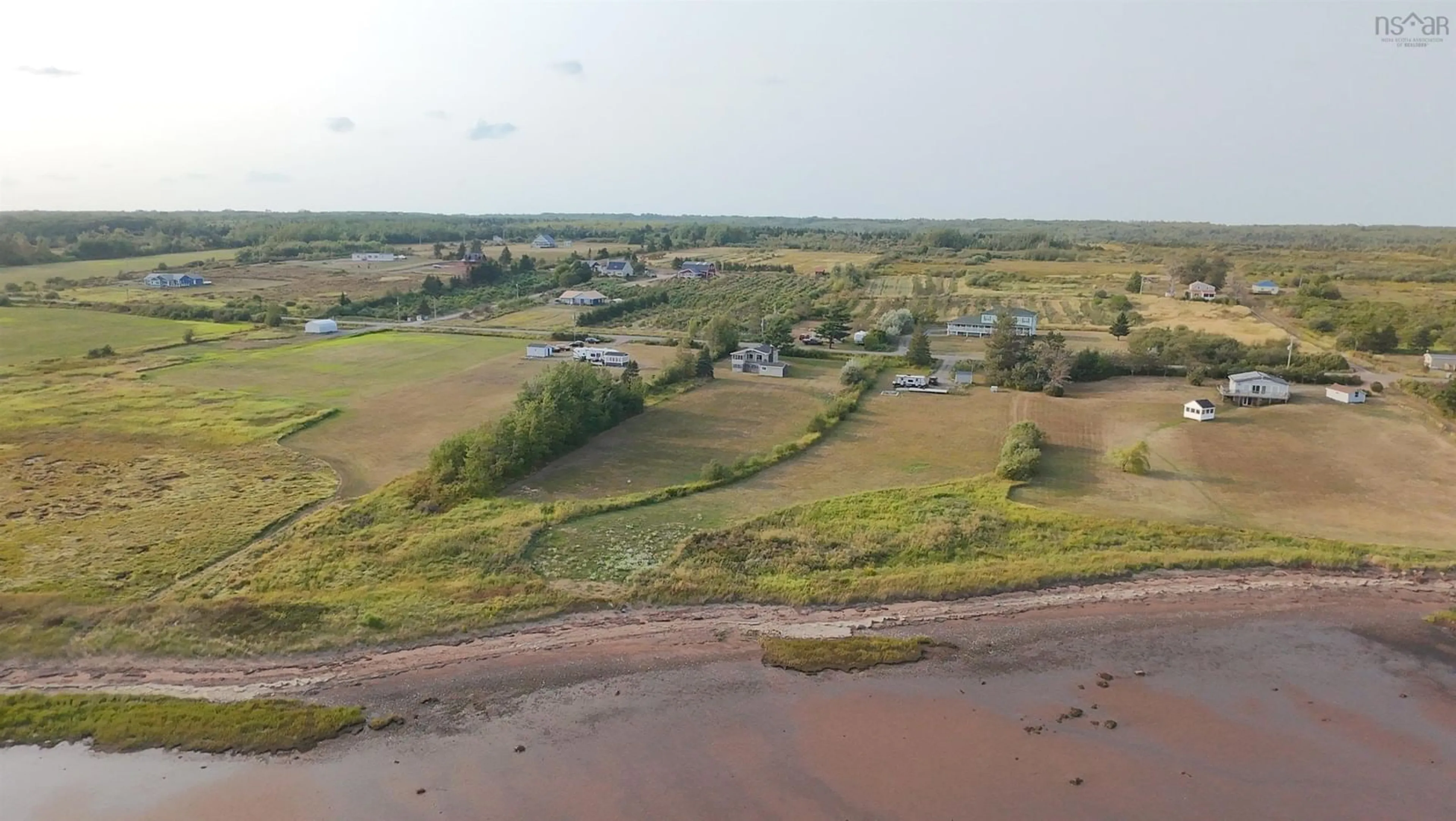 A pic from outside/outdoor area/front of a property/back of a property/a pic from drone, water/lake/river/ocean view for 2884 Malagash Rd, Malagash Centre Nova Scotia B0K 1E0
