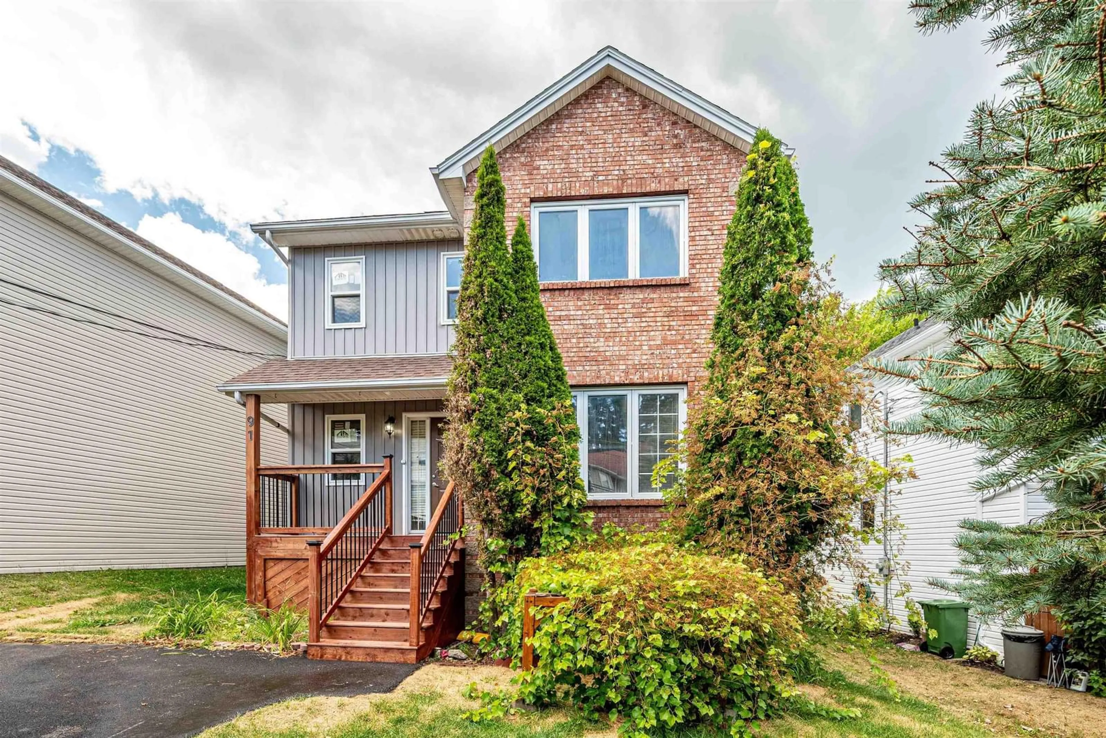 Home with brick exterior material, street for 91 Oceanview Dr, Bedford Nova Scotia B4A 4H5