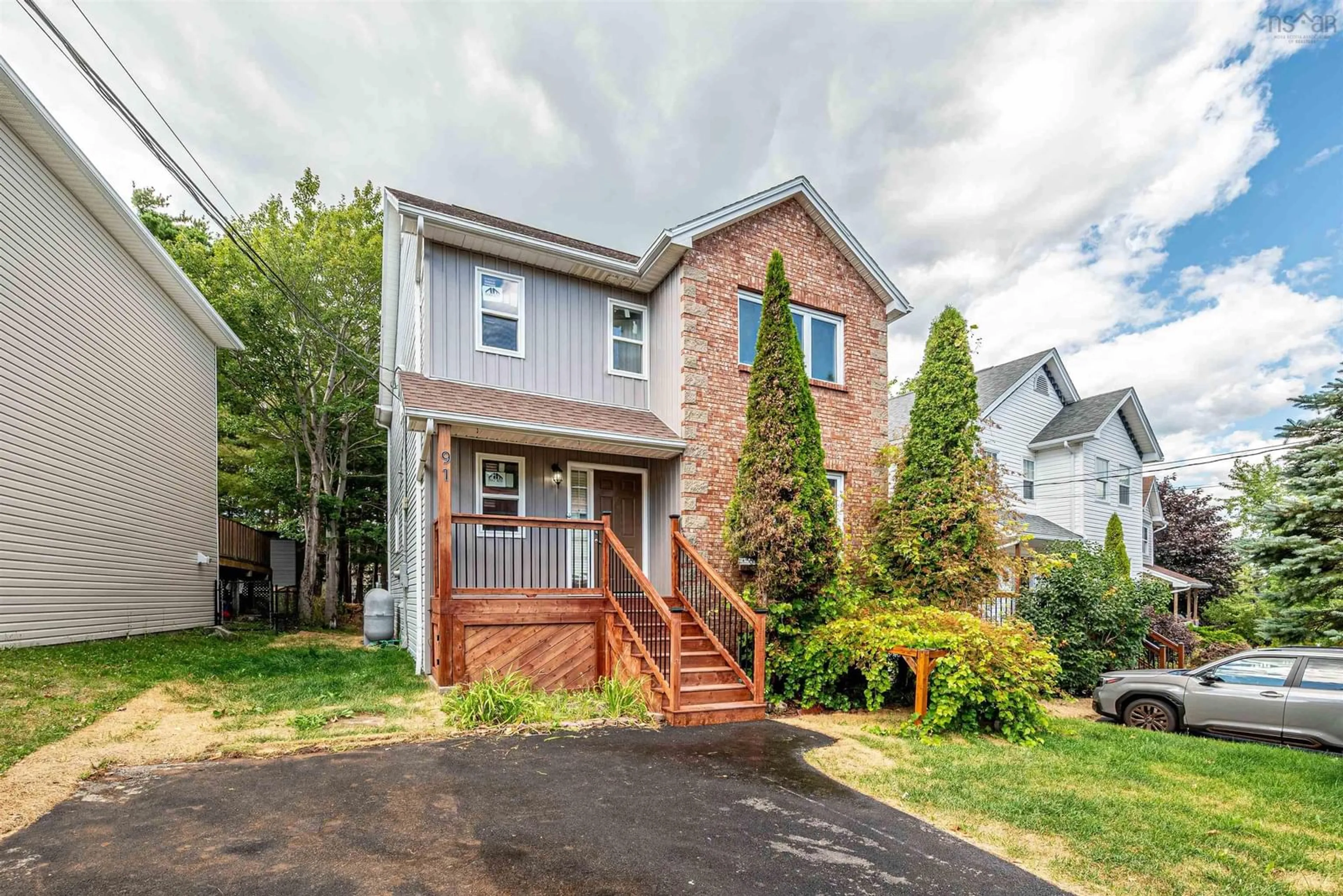 Home with brick exterior material, street for 91 Oceanview Dr, Bedford Nova Scotia B4A 4H5