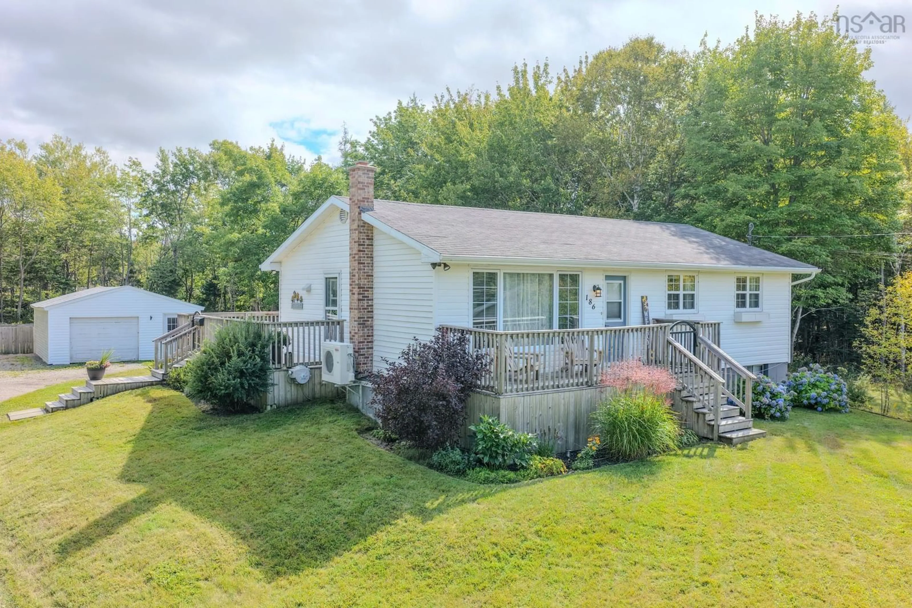 A pic from outside/outdoor area/front of a property/back of a property/a pic from drone, unknown for 186 Kenwood Dr, Sydney River Nova Scotia B1S 3N4