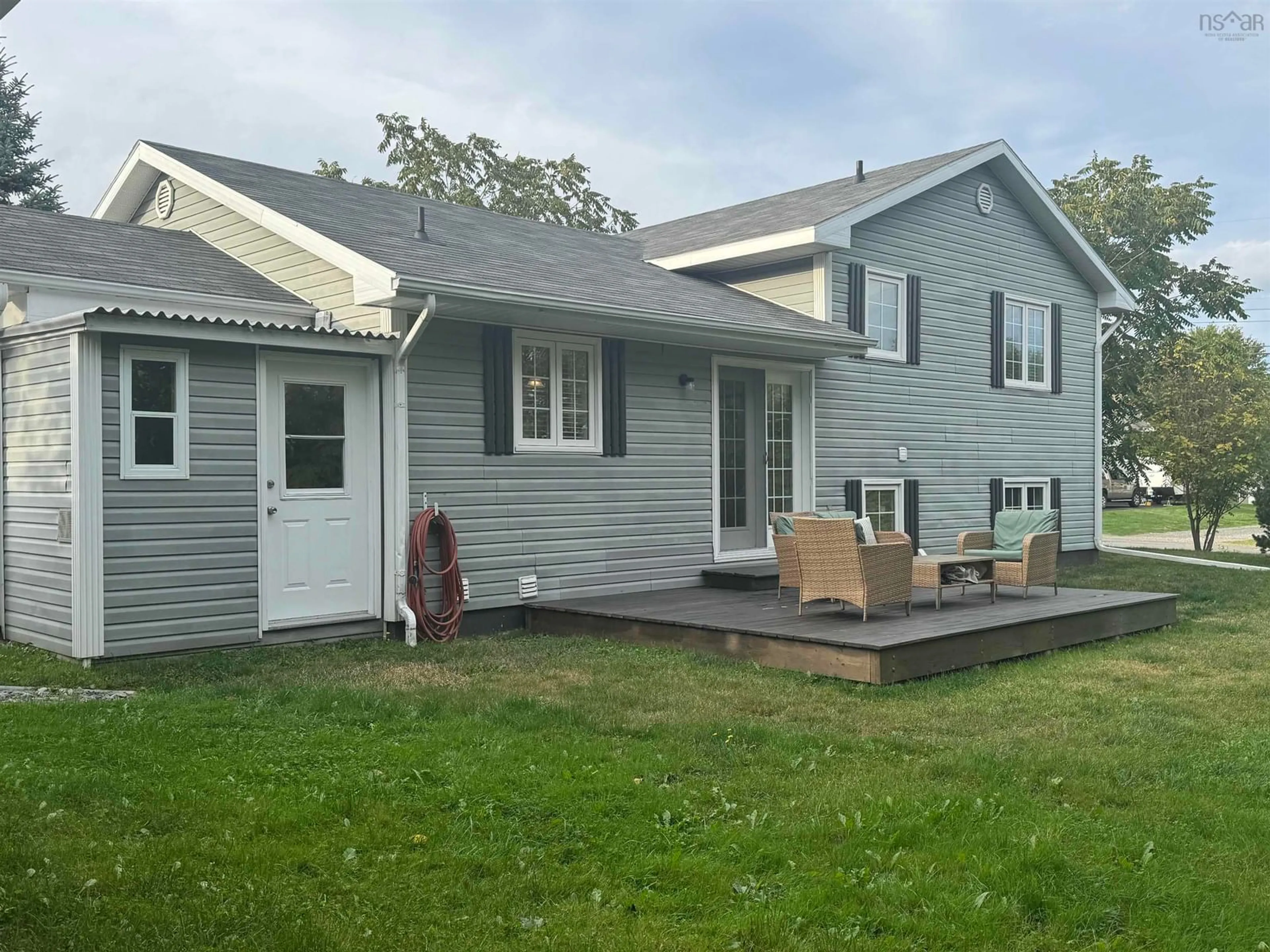 A pic from outside/outdoor area/front of a property/back of a property/a pic from drone, unknown for 3 Robert Ave, Sydney Mines Nova Scotia B1V 3J2