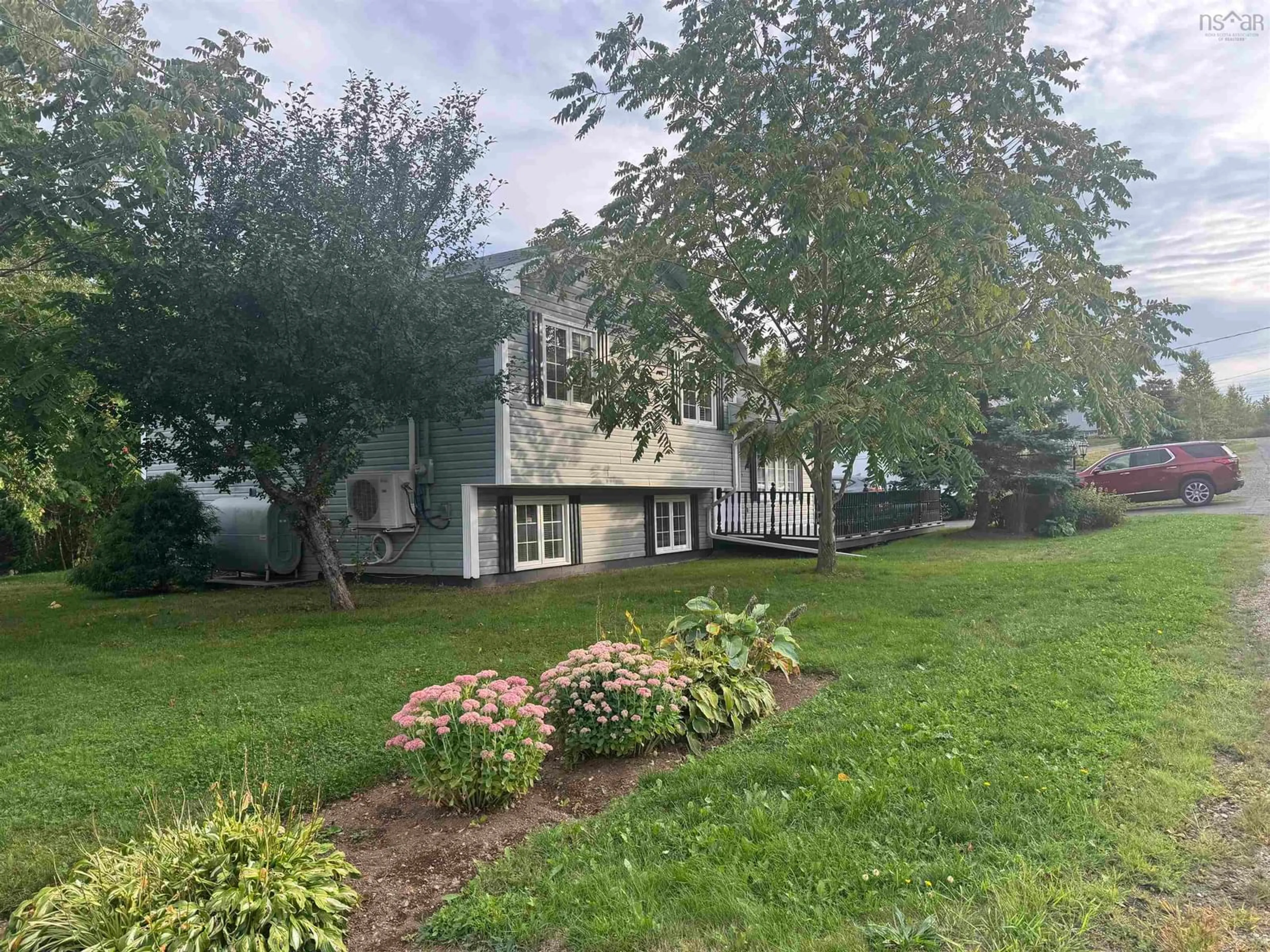 A pic from outside/outdoor area/front of a property/back of a property/a pic from drone, unknown for 3 Robert Ave, Sydney Mines Nova Scotia B1V 3J2