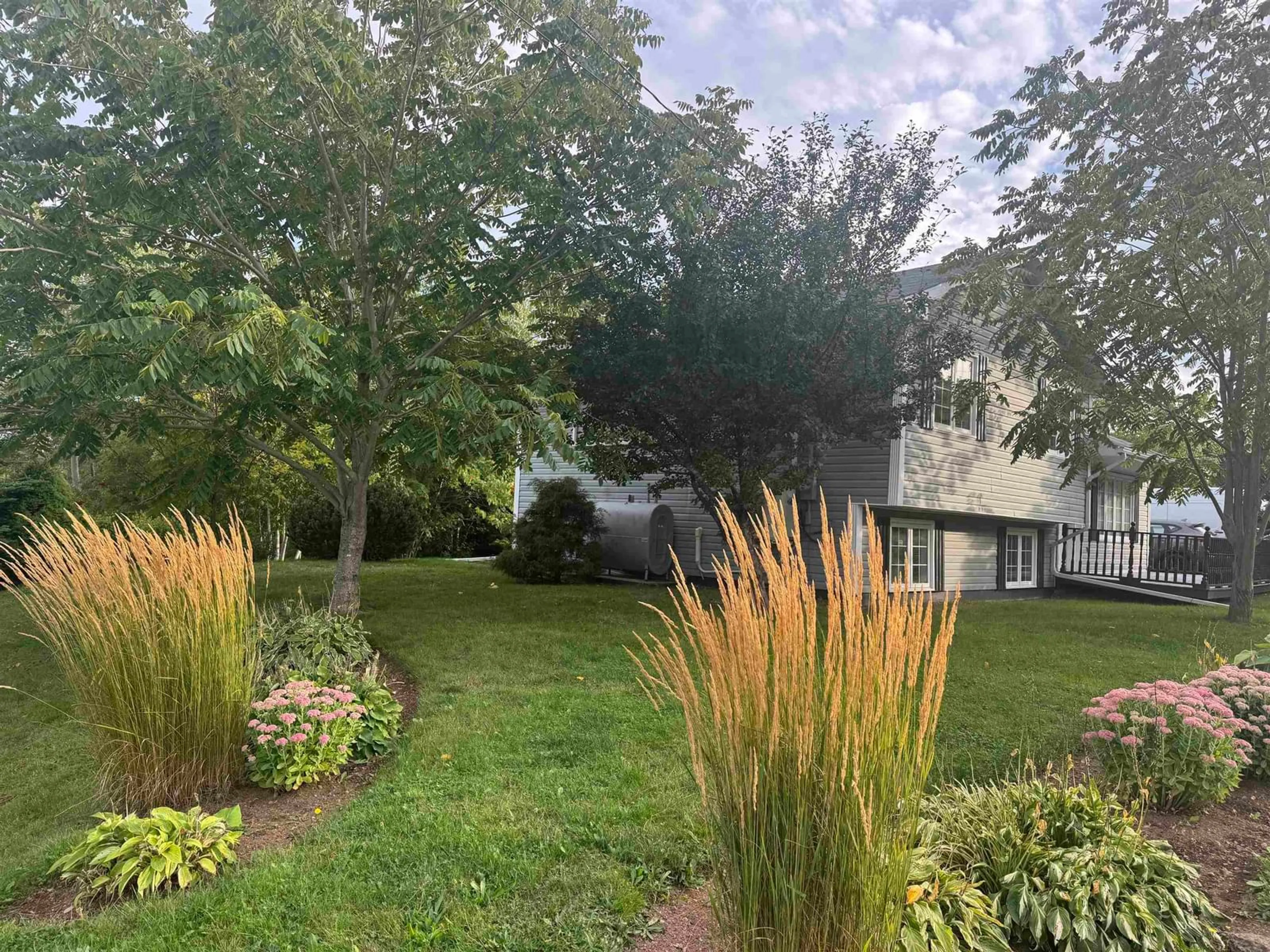 A pic from outside/outdoor area/front of a property/back of a property/a pic from drone, unknown for 3 Robert Ave, Sydney Mines Nova Scotia B1V 3J2