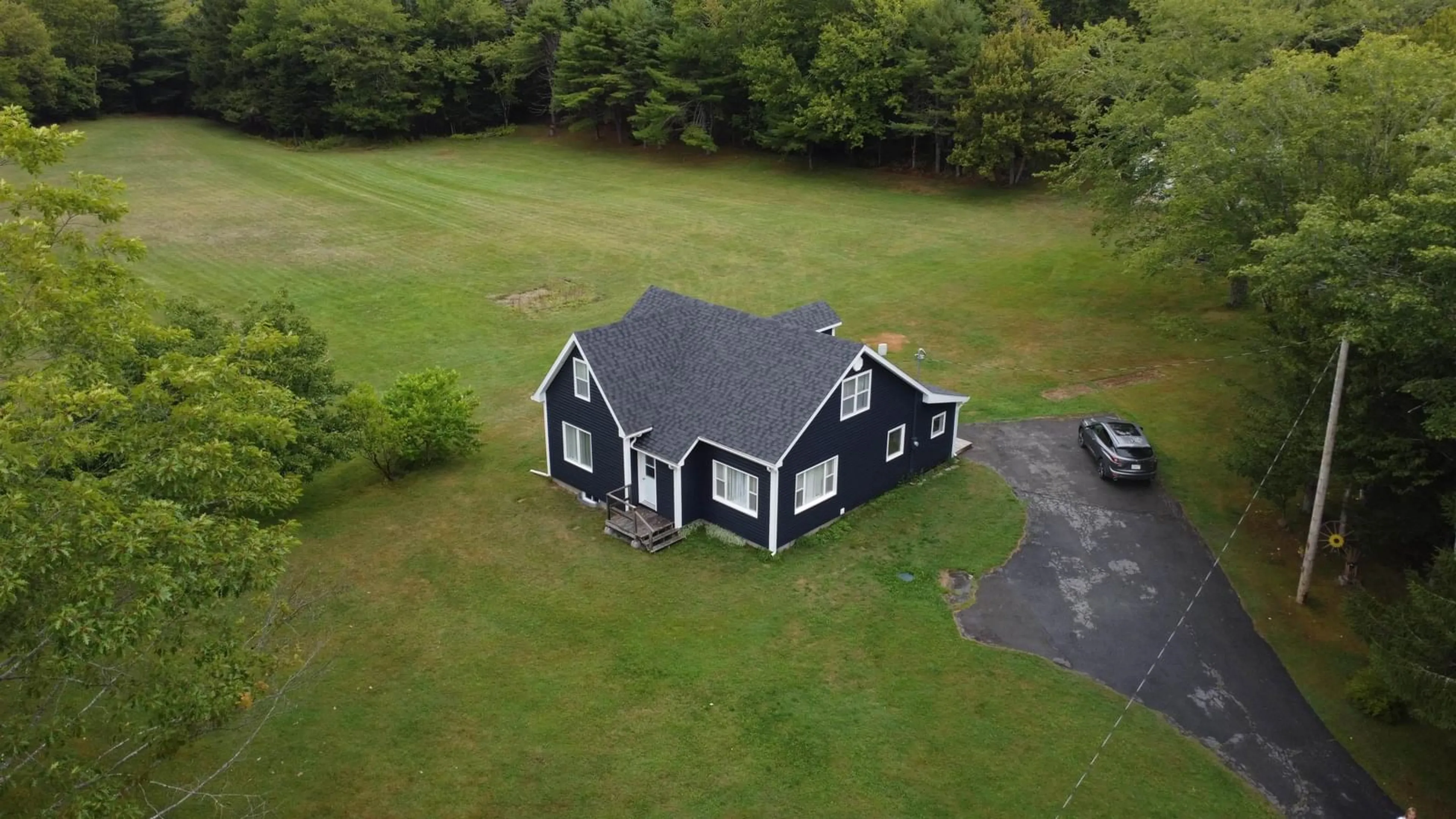 A pic from outside/outdoor area/front of a property/back of a property/a pic from drone, building for 8664 Highway 7, Sherbrooke Nova Scotia B0J 3C0