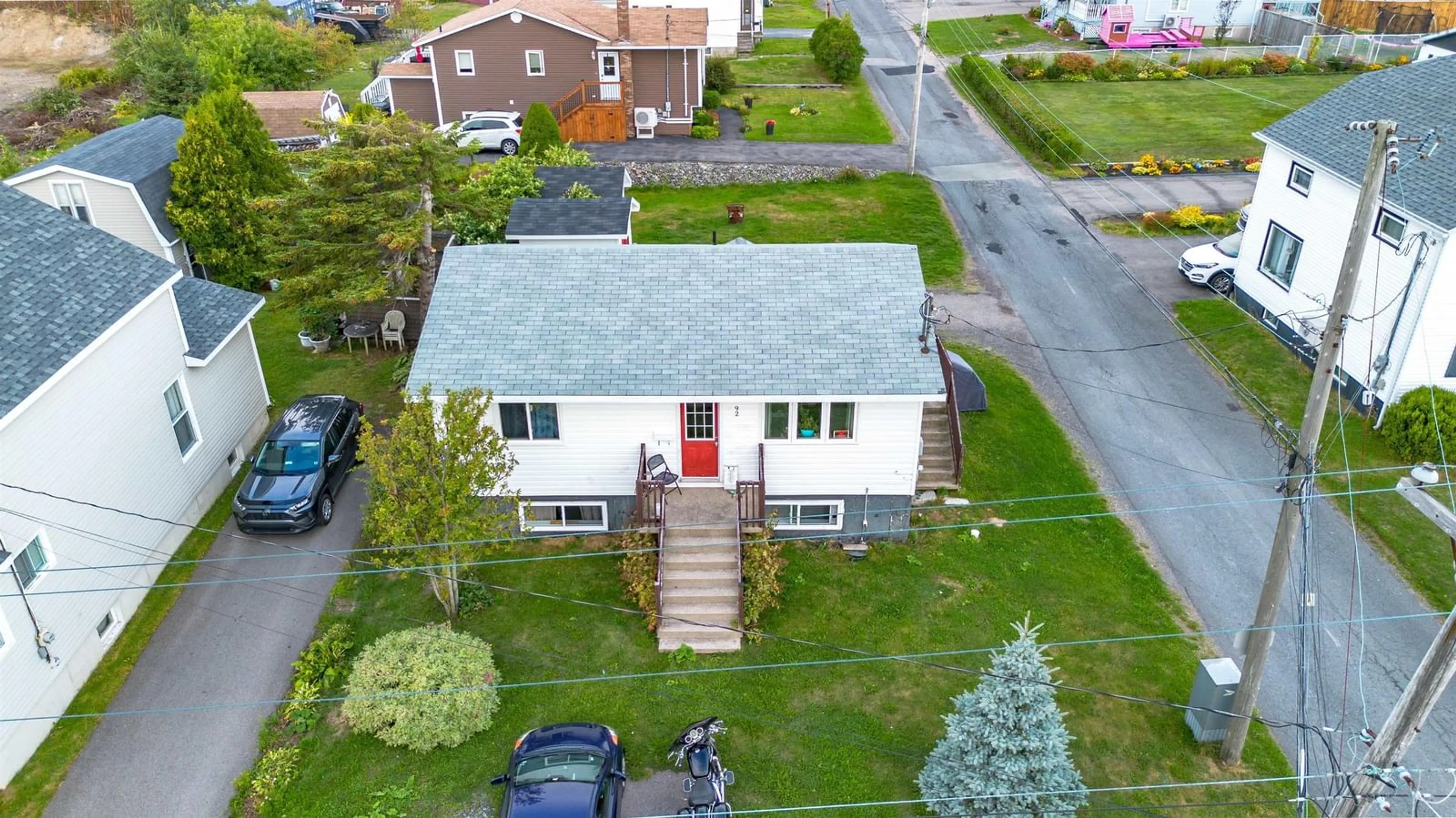 A pic from outside/outdoor area/front of a property/back of a property/a pic from drone, street for 92 Highland St, Glace Bay Nova Scotia B1A 2V1