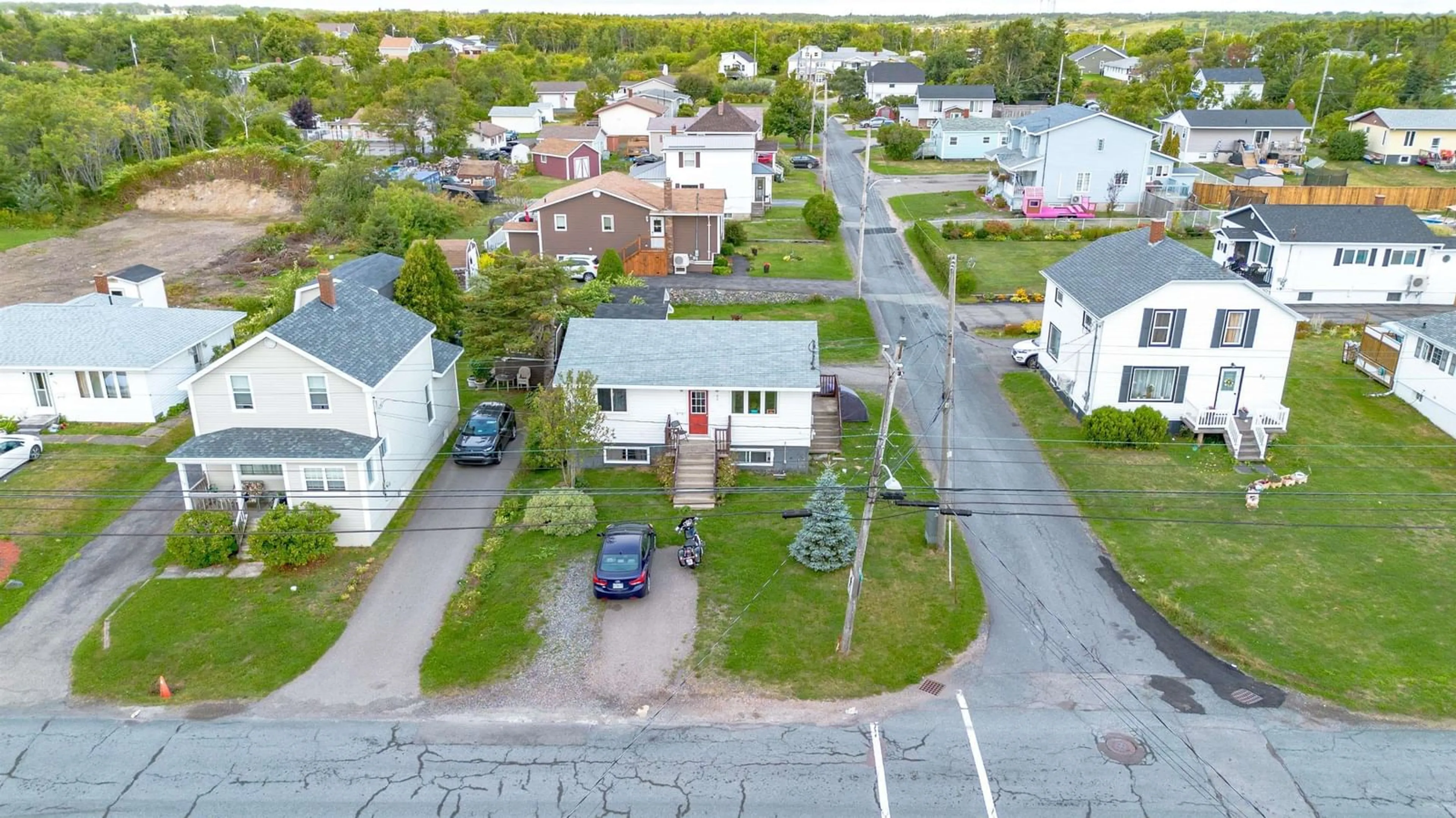A pic from outside/outdoor area/front of a property/back of a property/a pic from drone, street for 92 Highland St, Glace Bay Nova Scotia B1A 2V1