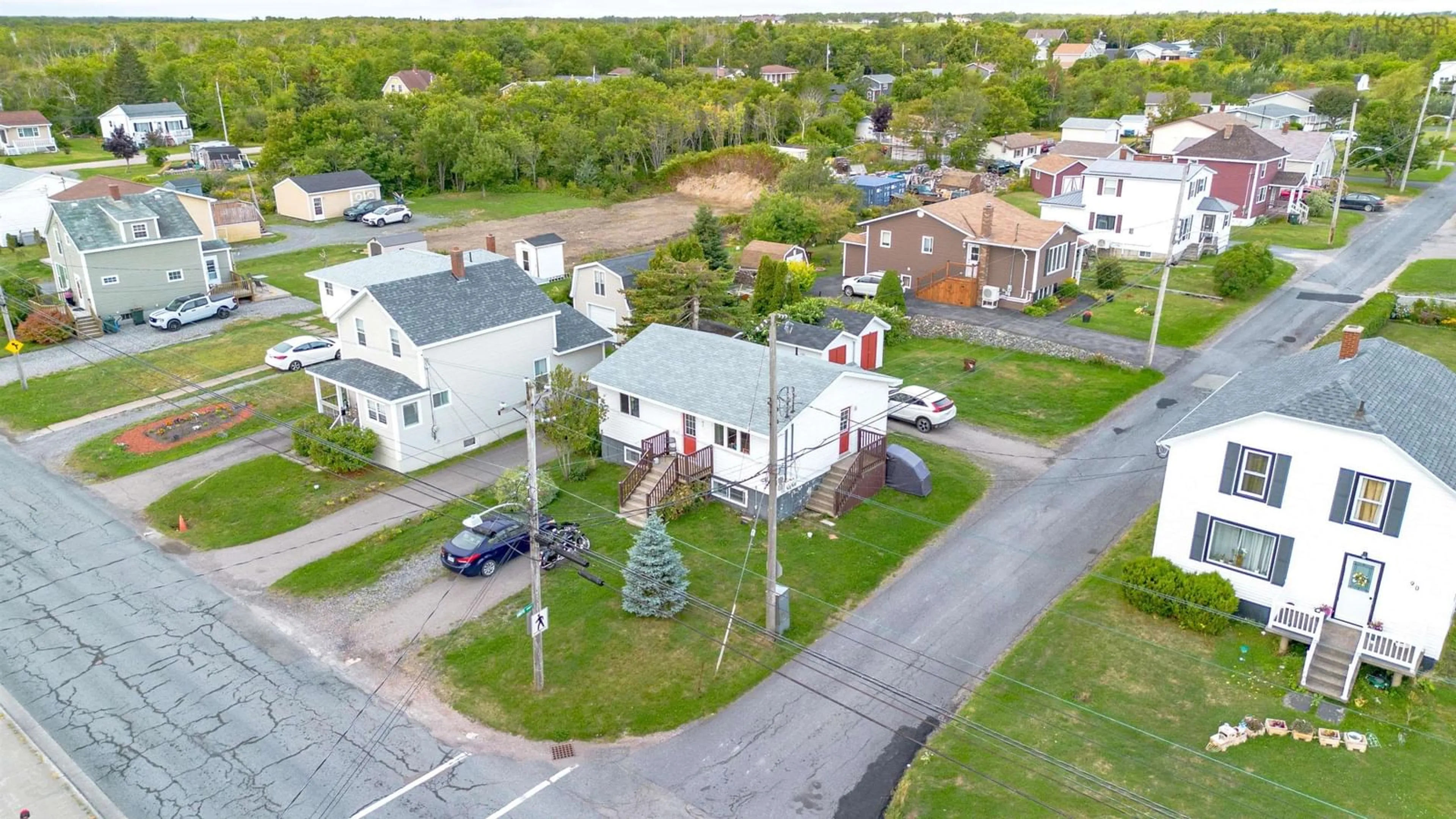 A pic from outside/outdoor area/front of a property/back of a property/a pic from drone, street for 92 Highland St, Glace Bay Nova Scotia B1A 2V1