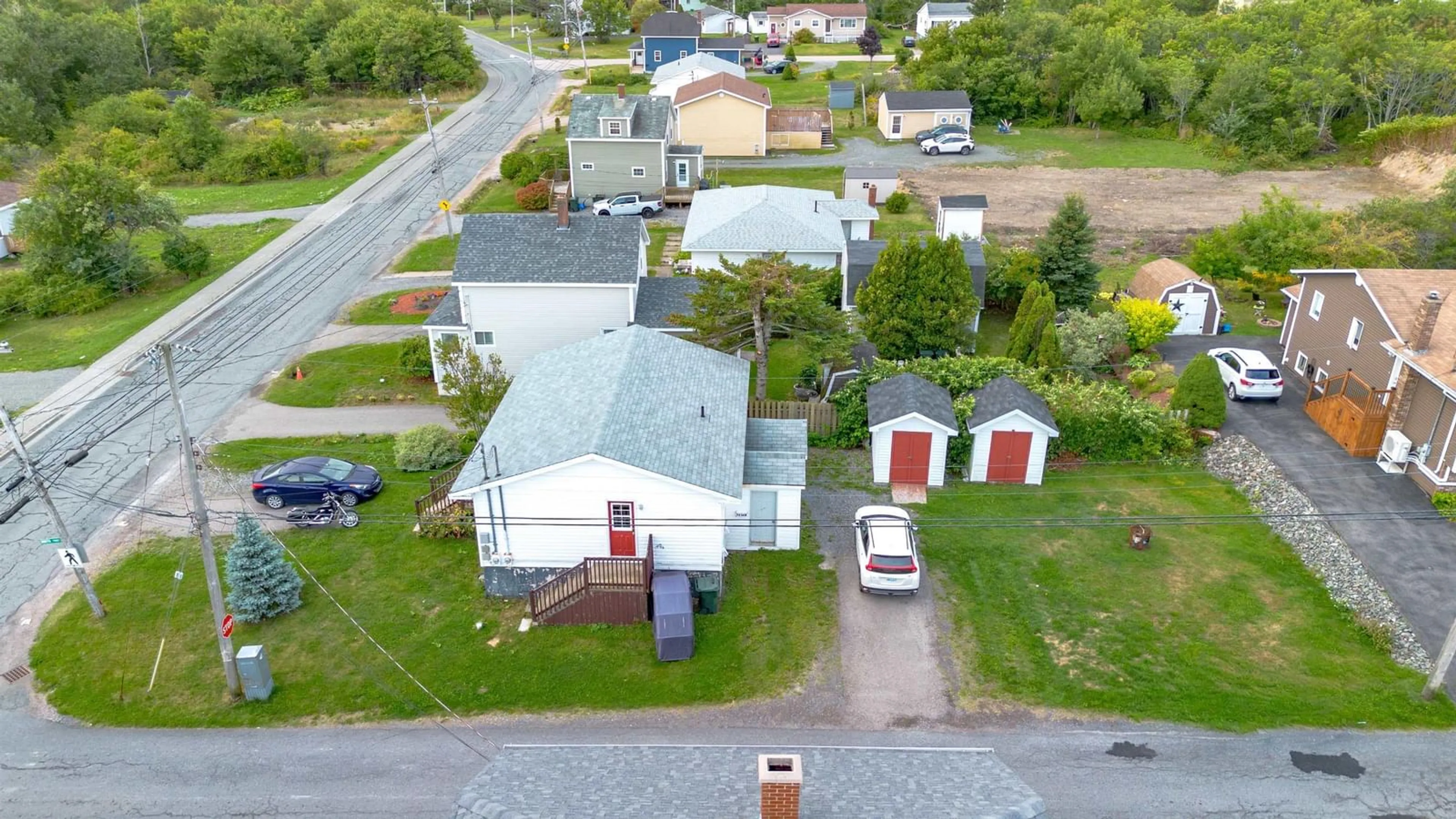 A pic from outside/outdoor area/front of a property/back of a property/a pic from drone, street for 92 Highland St, Glace Bay Nova Scotia B1A 2V1