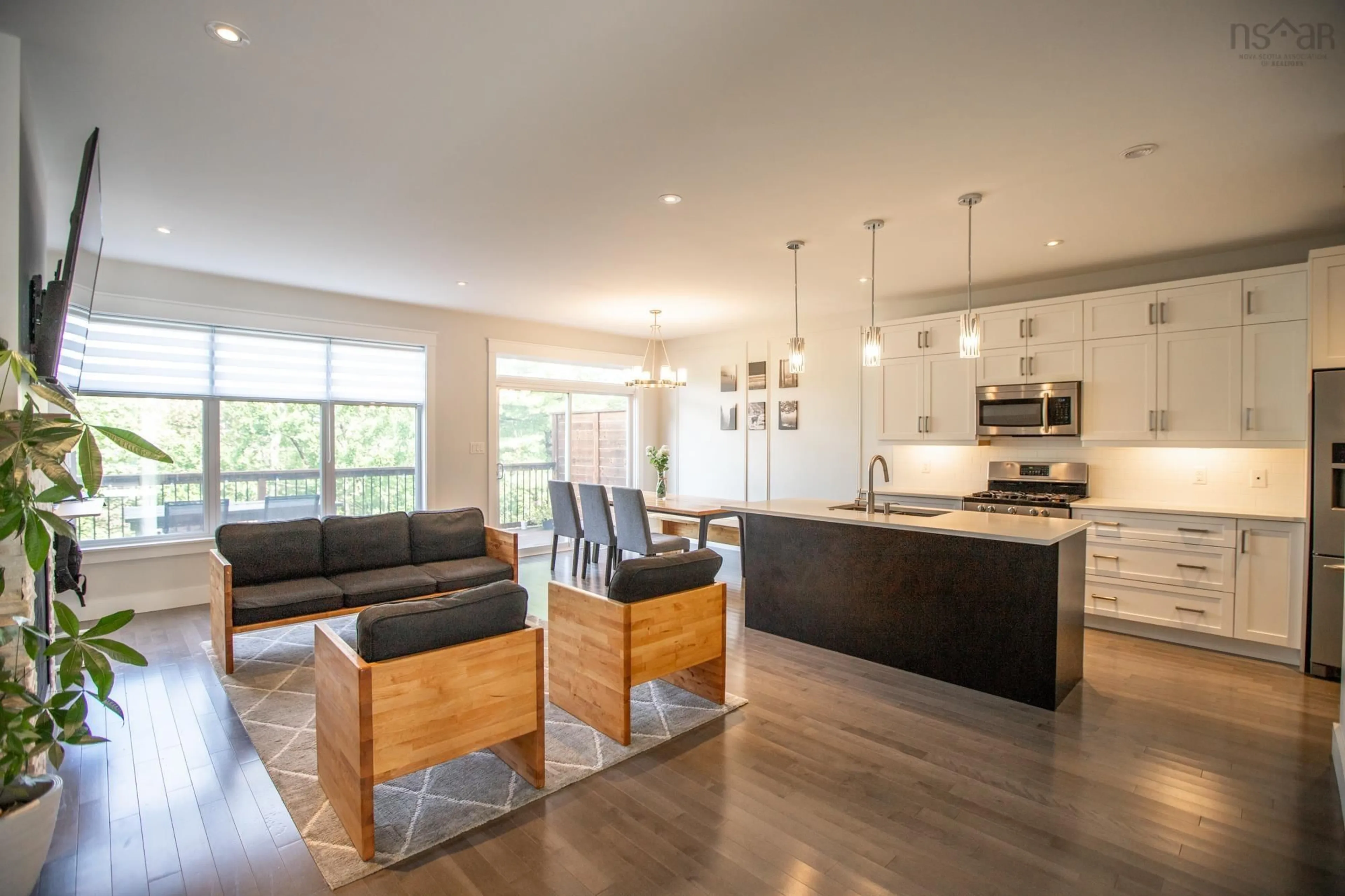 Open concept kitchen, wood/laminate floor for 391 Fleetview Dr, Clayton Park Nova Scotia B3M 0L3