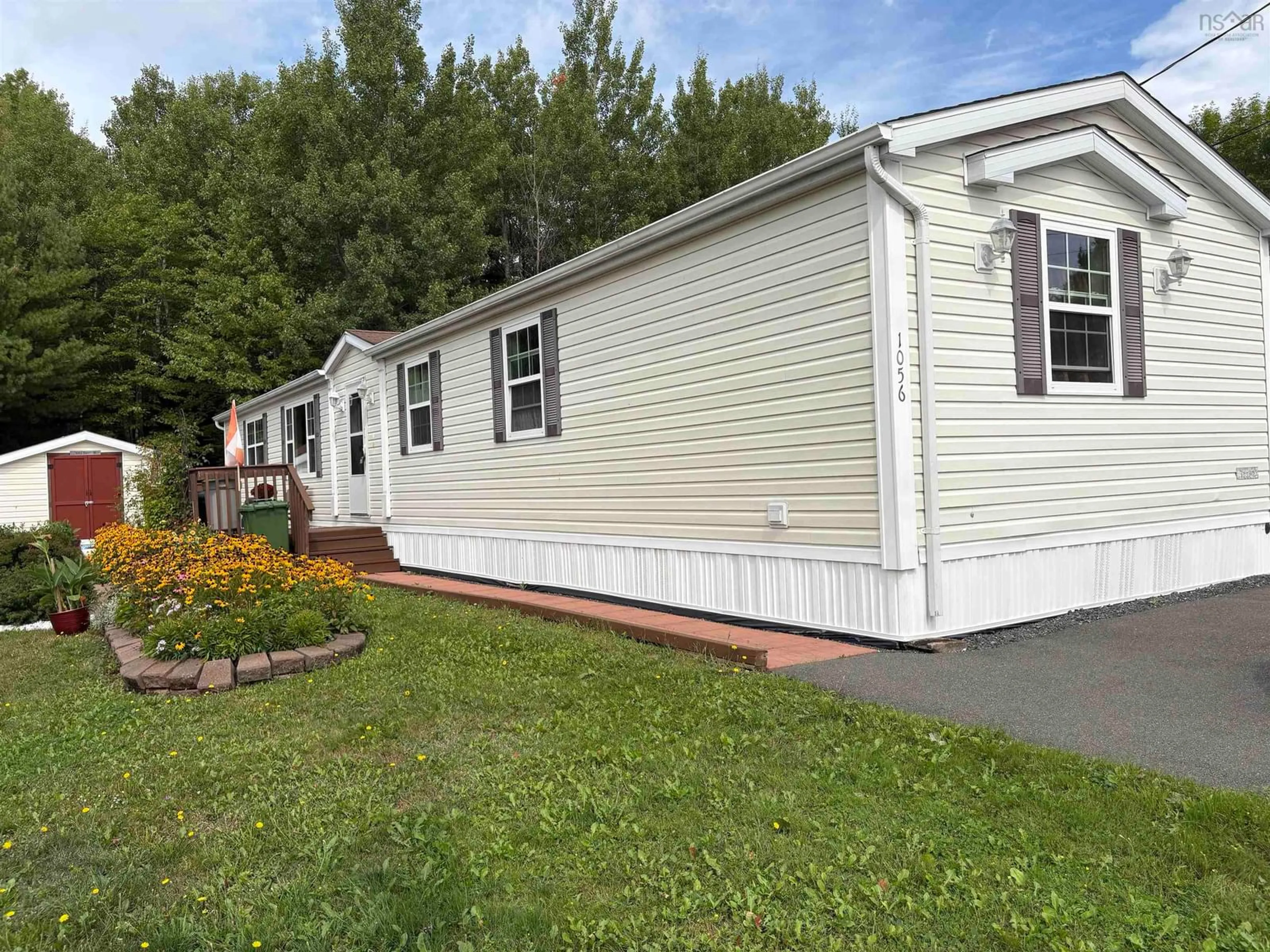 Home with vinyl exterior material, street for 1056 Park Lane, Westville Nova Scotia B0K 2A0