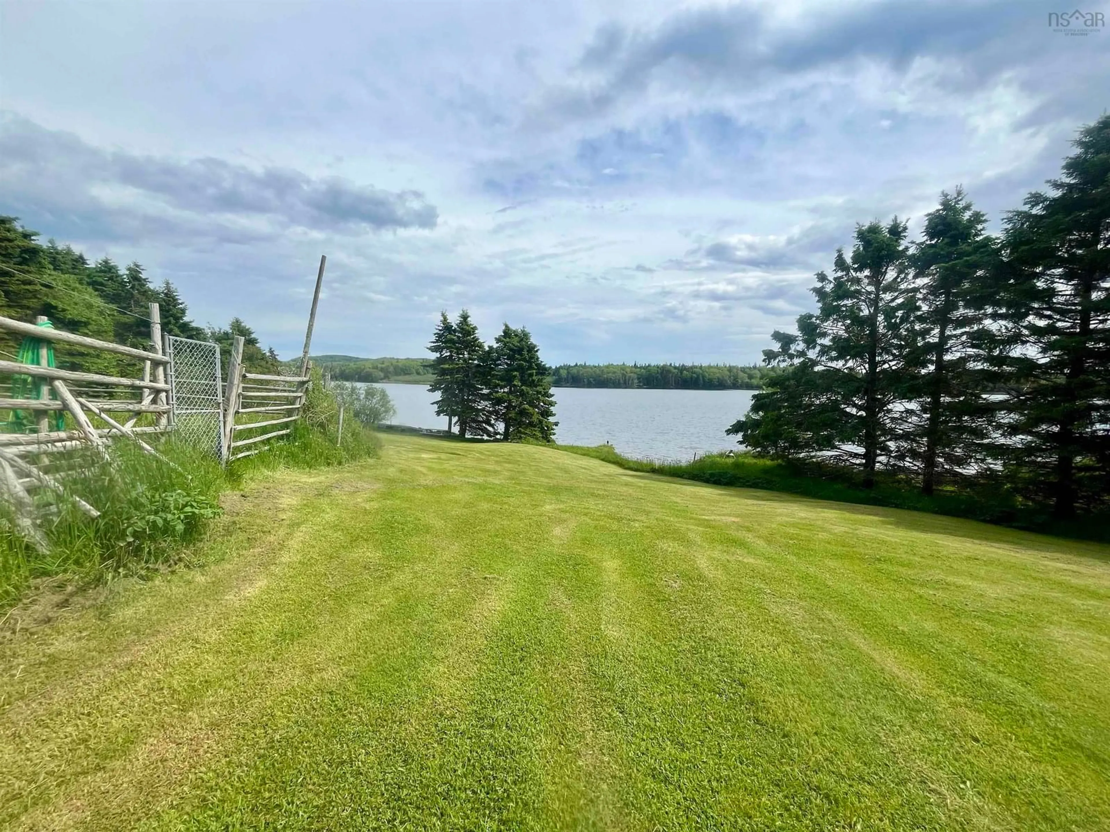 A pic from outside/outdoor area/front of a property/back of a property/a pic from drone, water/lake/river/ocean view for 96 Landry Lane, Sampsonville Nova Scotia B0E 3B0