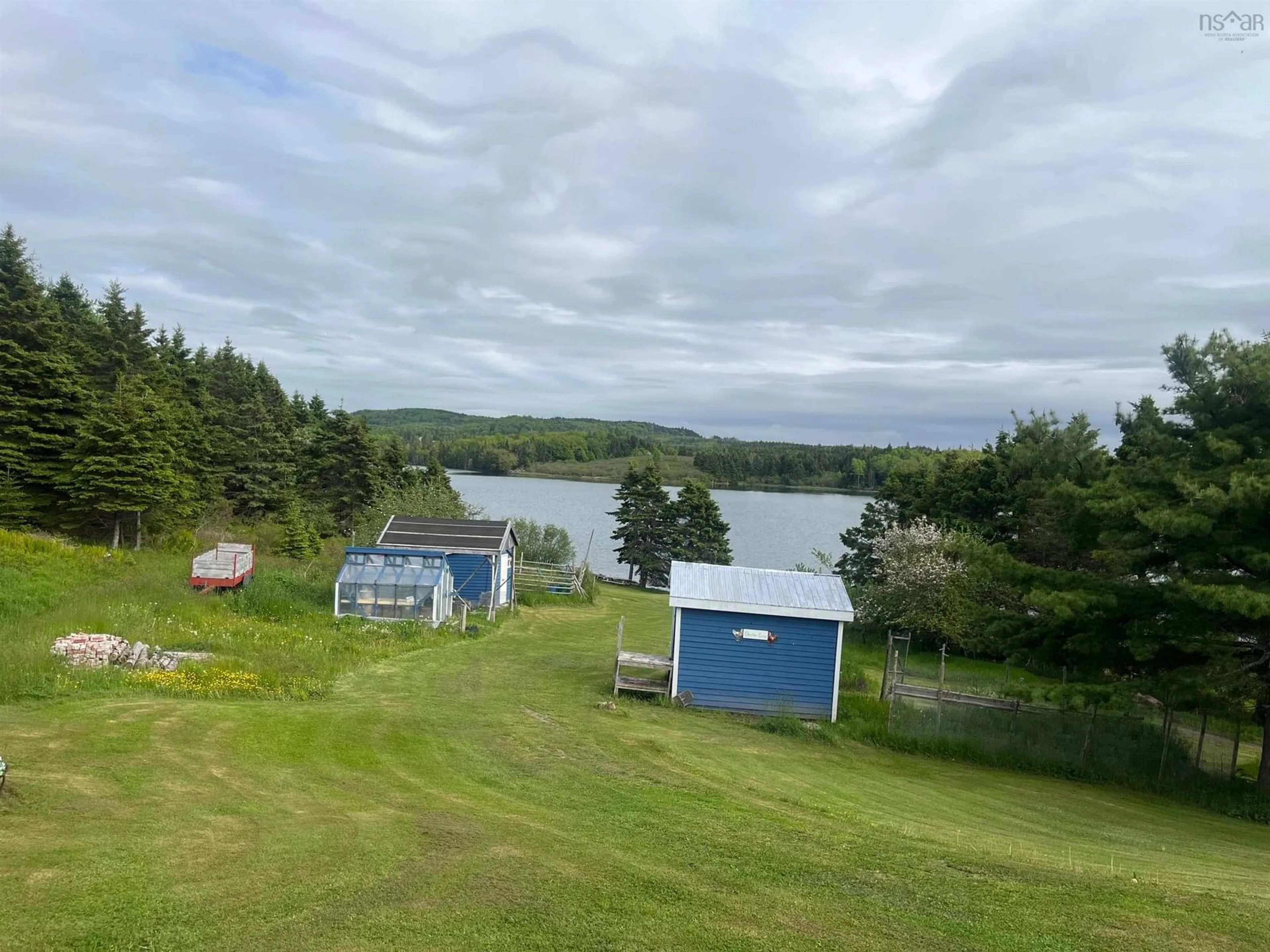 A pic from outside/outdoor area/front of a property/back of a property/a pic from drone, water/lake/river/ocean view for 96 Landry Lane, Sampsonville Nova Scotia B0E 3B0