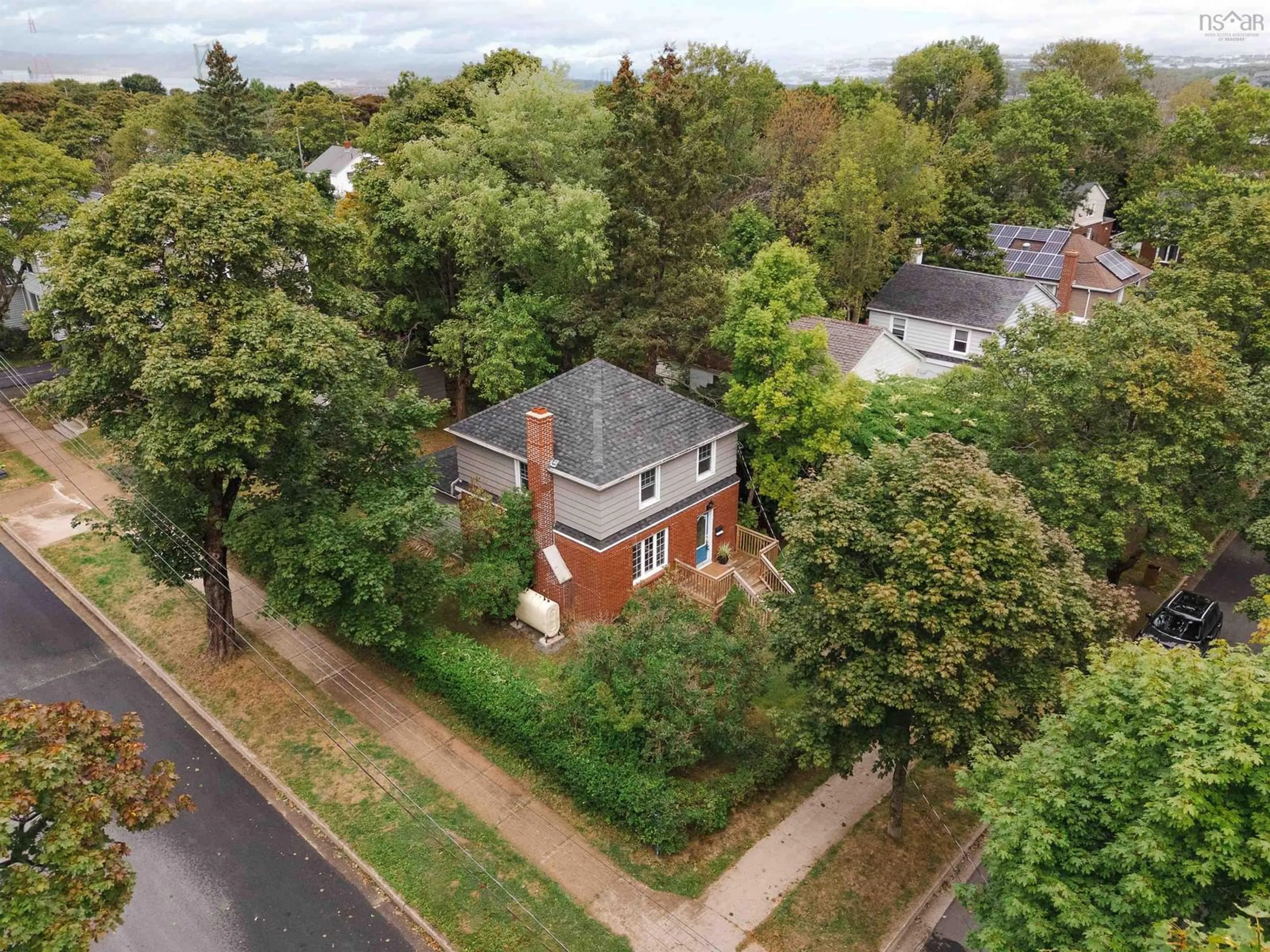 A pic from outside/outdoor area/front of a property/back of a property/a pic from drone, street for 5680 Drummond Court, Halifax Nova Scotia B3K 3Z5