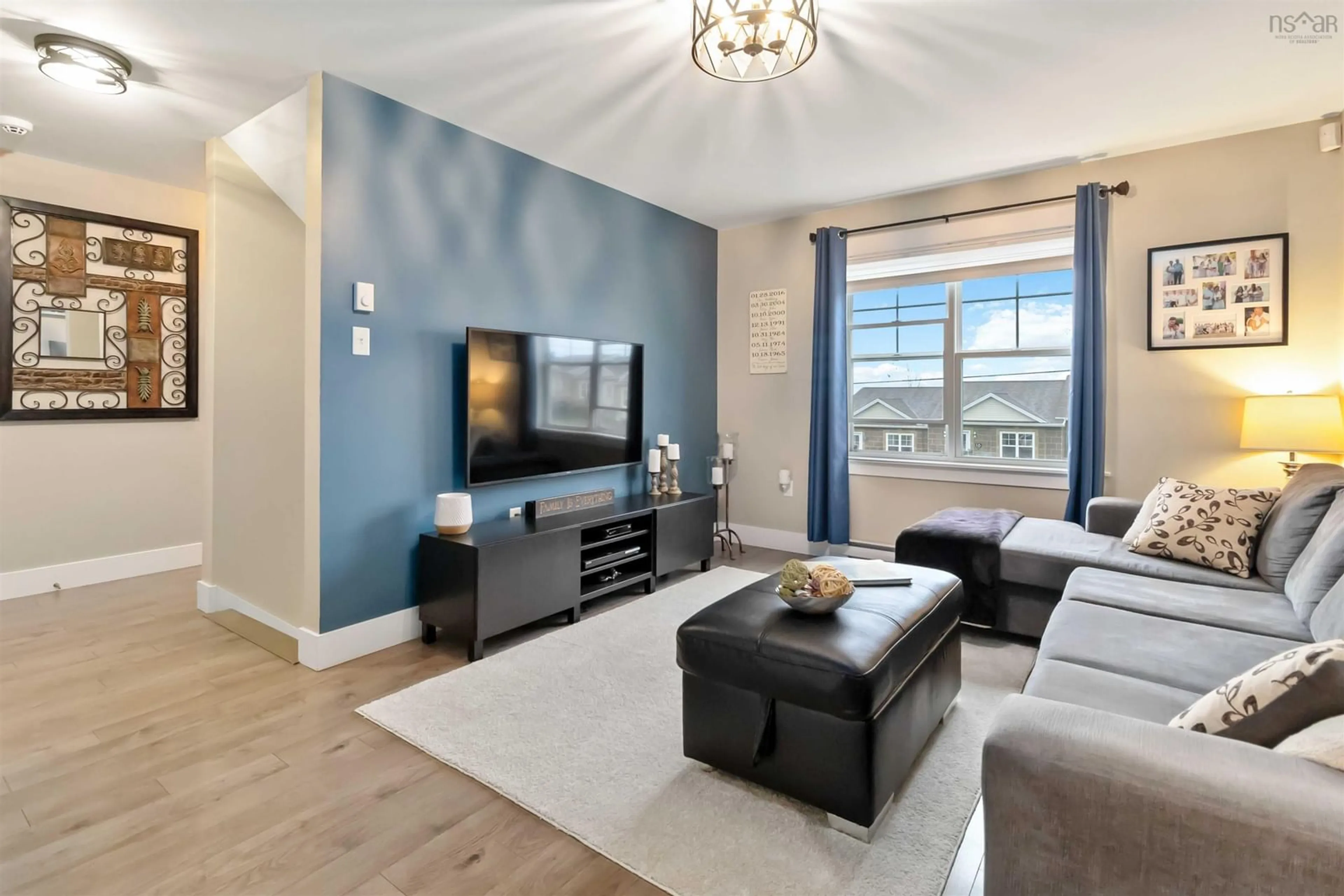 Living room with furniture, wood/laminate floor for 17 Fescue Court, Middle Sackville Nova Scotia B4E 0L7