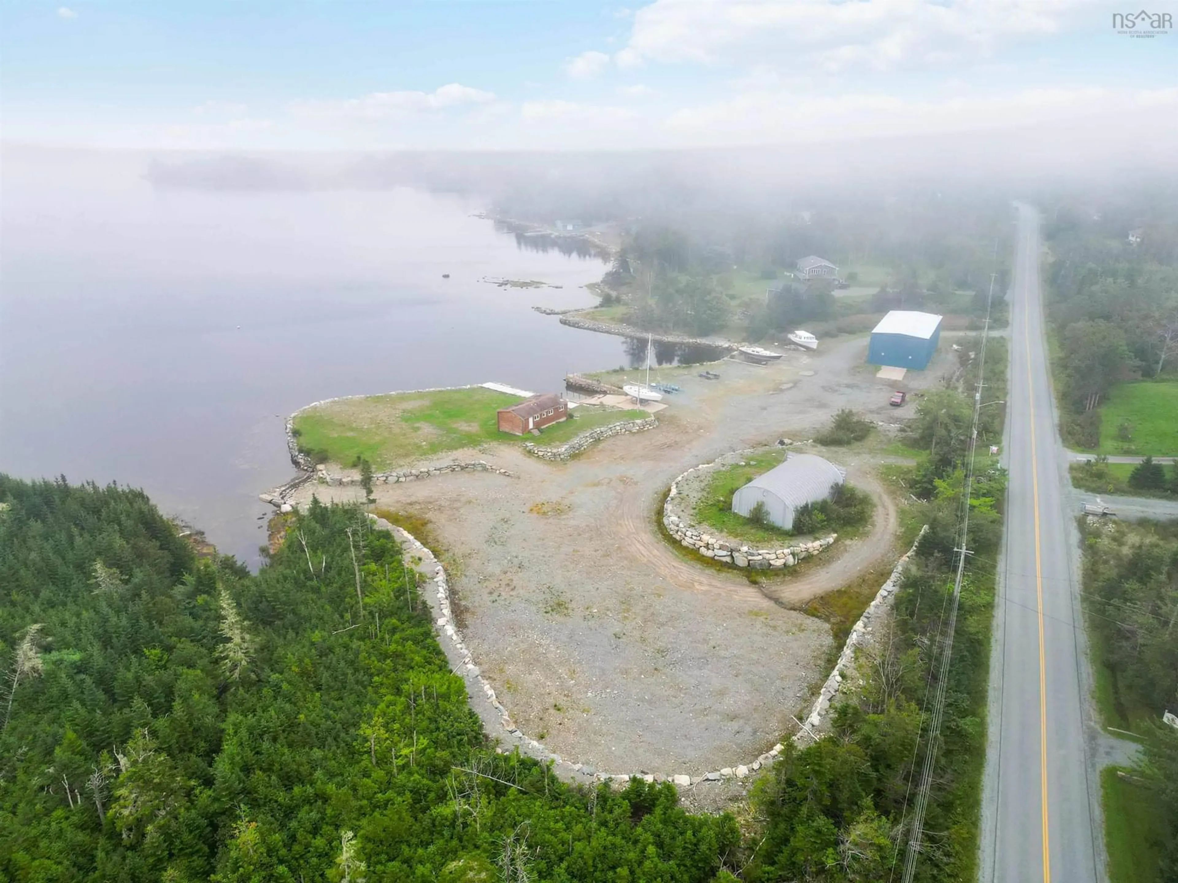 A pic from outside/outdoor area/front of a property/back of a property/a pic from drone, water/lake/river/ocean view for 1199 West Jeddore Rd, West Jeddore Nova Scotia B0J 1P0