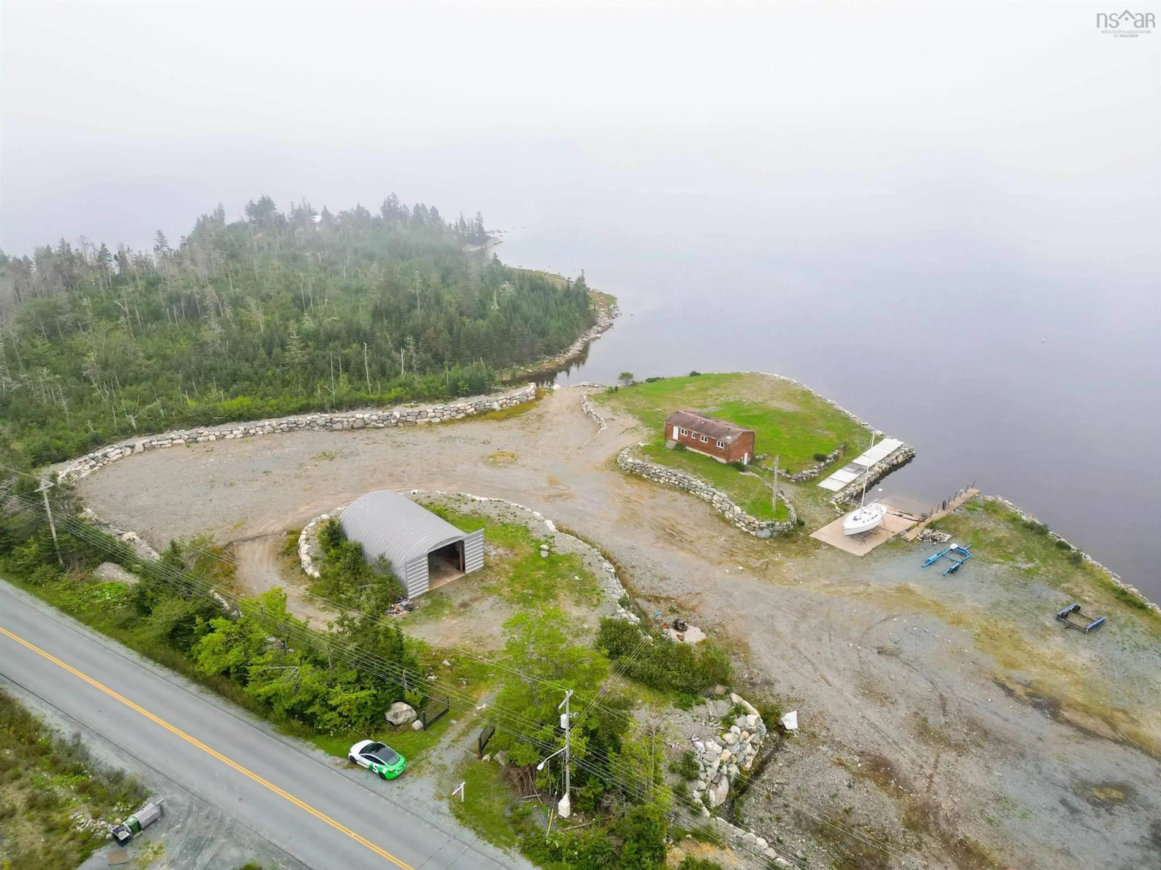 A pic from outside/outdoor area/front of a property/back of a property/a pic from drone, water/lake/river/ocean view for 1199 West Jeddore Rd, West Jeddore Nova Scotia B0J 1P0