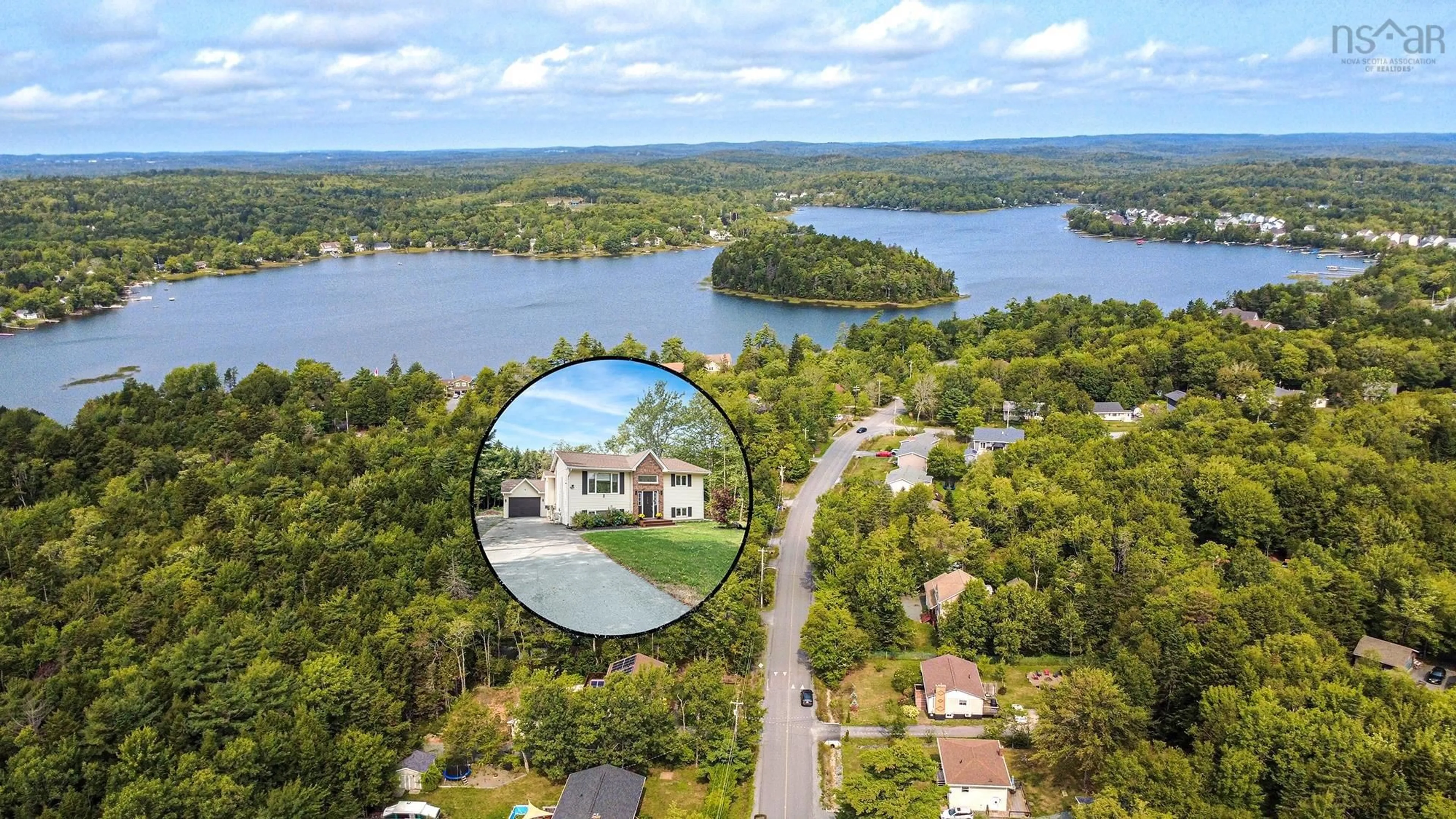 A pic from outside/outdoor area/front of a property/back of a property/a pic from drone, water/lake/river/ocean view for 124 Fenerty Rd, Middle Sackville Nova Scotia B4E 3B1
