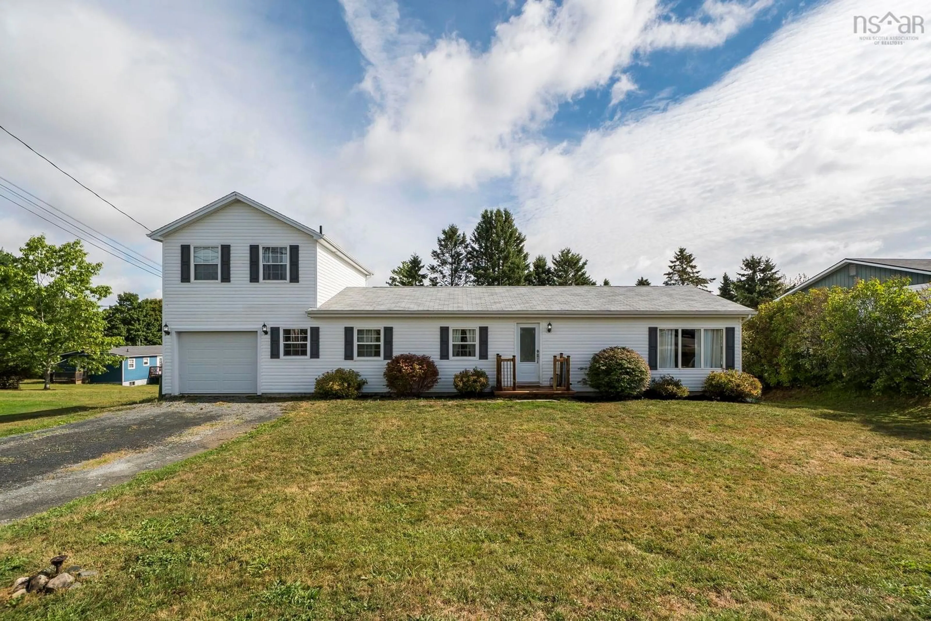 Home with vinyl exterior material, street for 5 Pleasant St, Hantsport Nova Scotia B0P 1P0