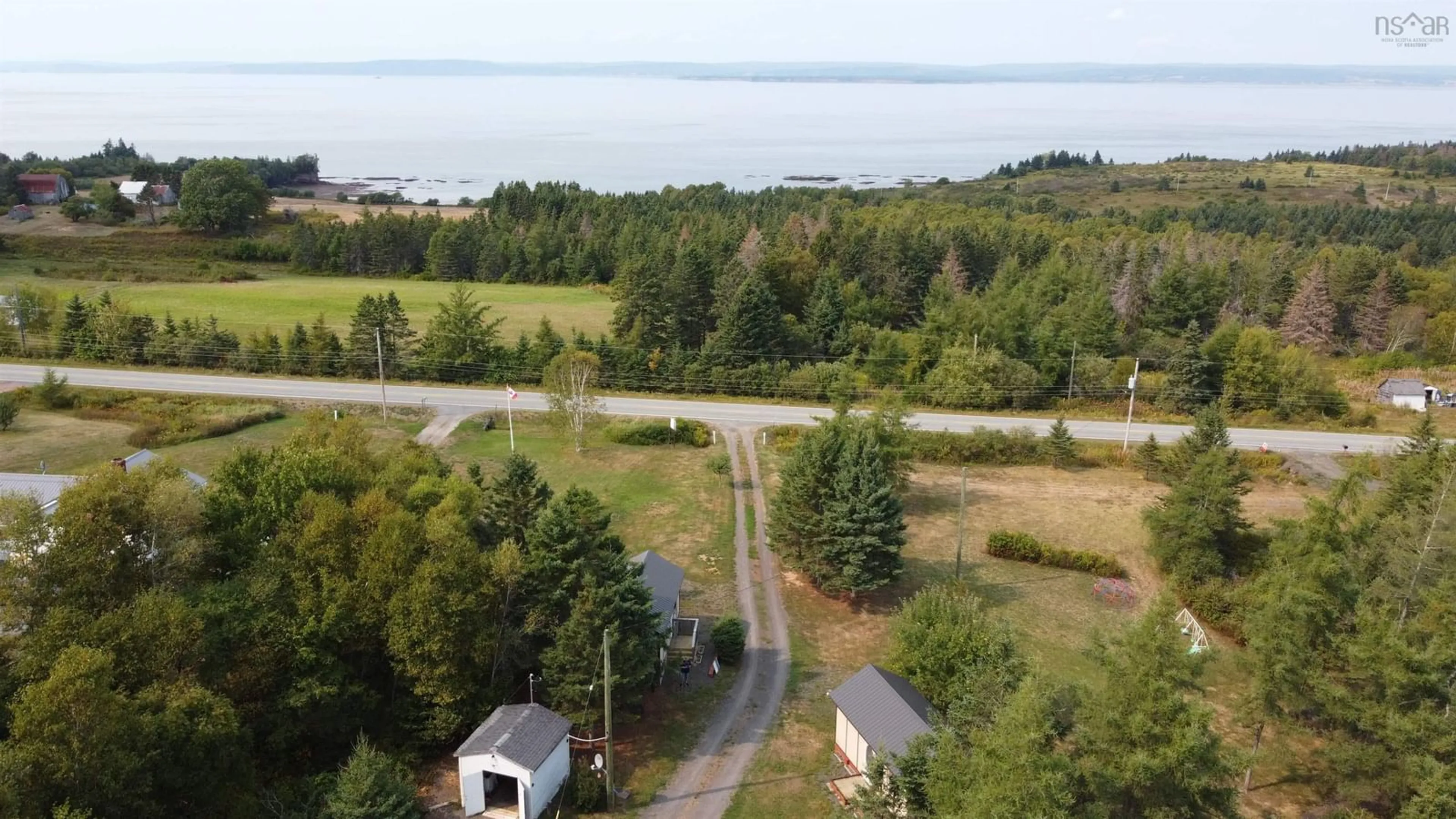 A pic from outside/outdoor area/front of a property/back of a property/a pic from drone, water/lake/river/ocean view for 2844 Highway 215, Moose Brook Nova Scotia B0N 2R0