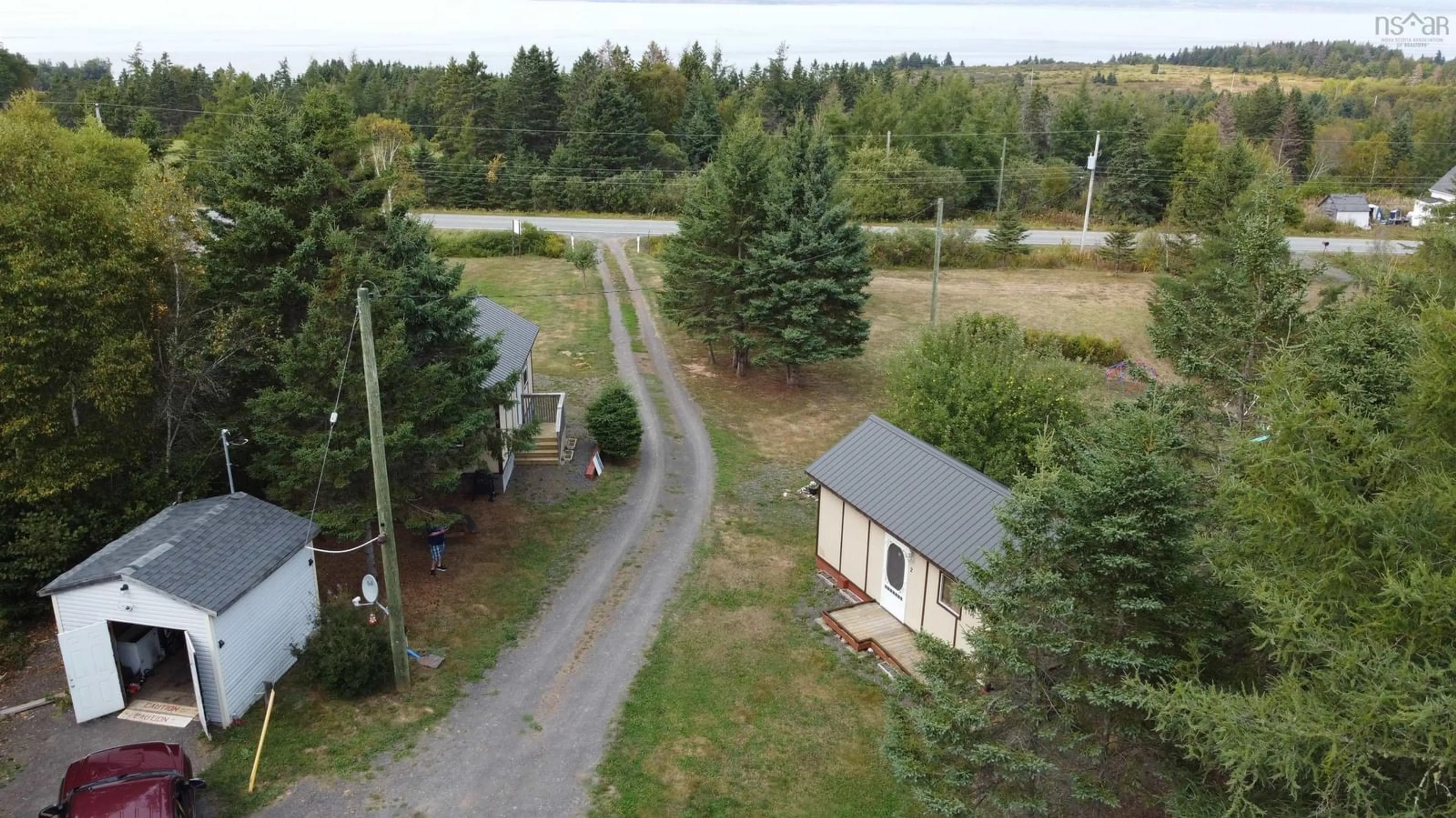 A pic from outside/outdoor area/front of a property/back of a property/a pic from drone, unknown for 2844 Highway 215, Moose Brook Nova Scotia B0N 2R0