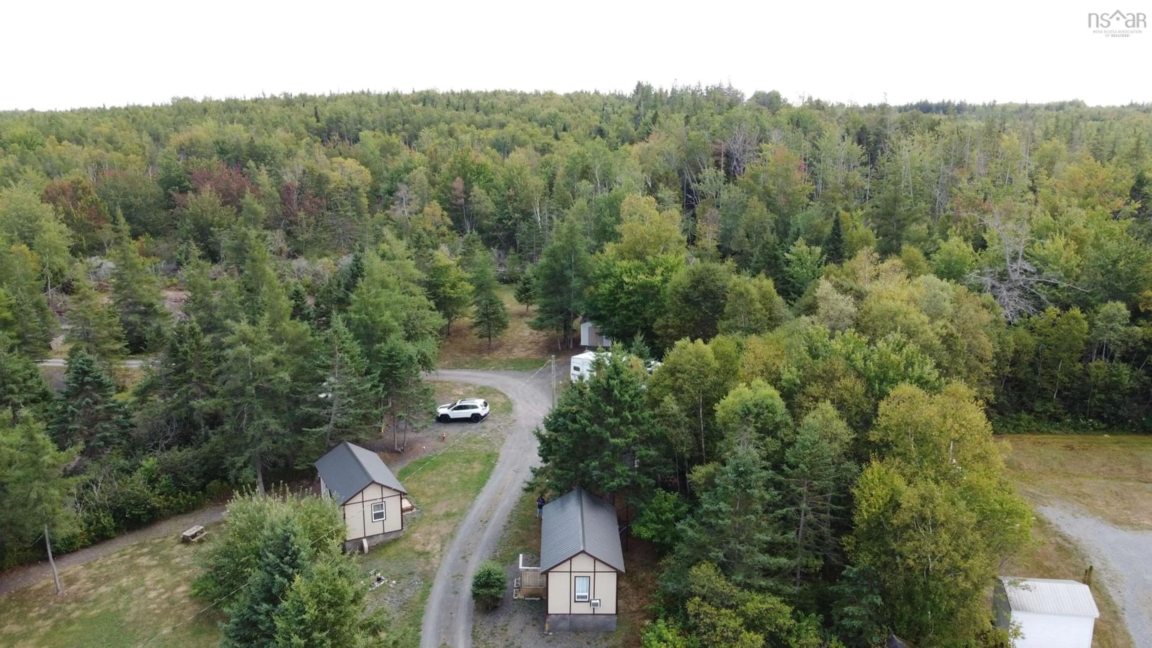 A pic from outside/outdoor area/front of a property/back of a property/a pic from drone, forest/trees view for 2844 Highway 215, Moose Brook Nova Scotia B0N 2R0
