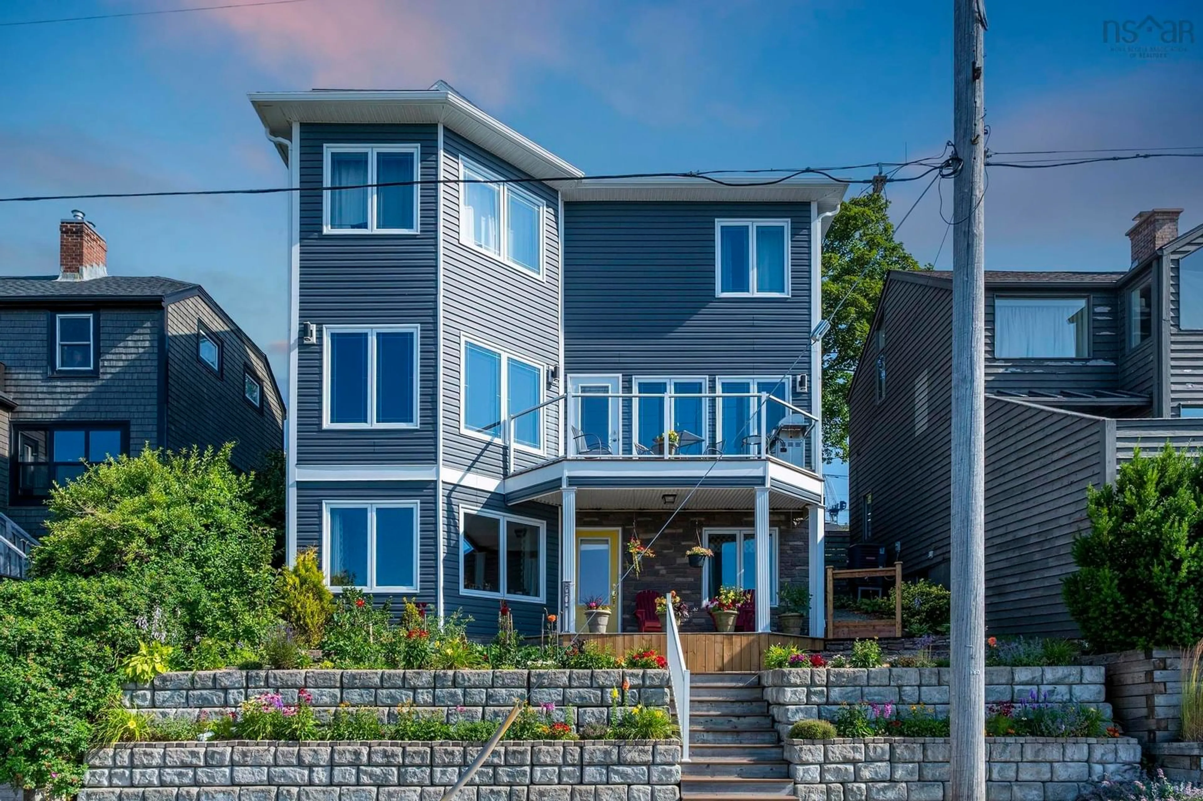 Home with vinyl exterior material, street for 60 Shore Rd, Dartmouth Nova Scotia B3A 1A3