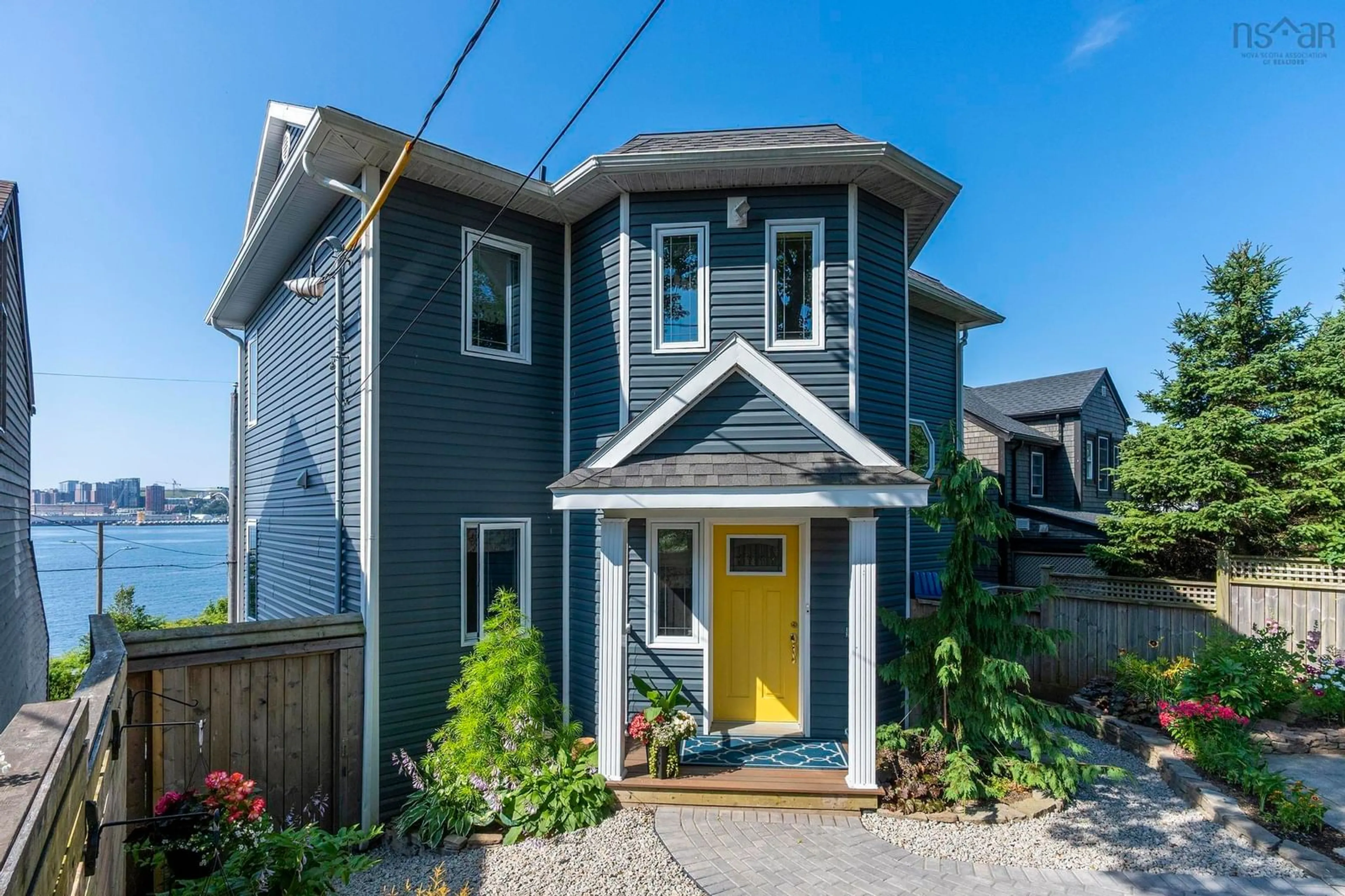 Home with vinyl exterior material, street for 60 Shore Rd, Dartmouth Nova Scotia B3A 1A3