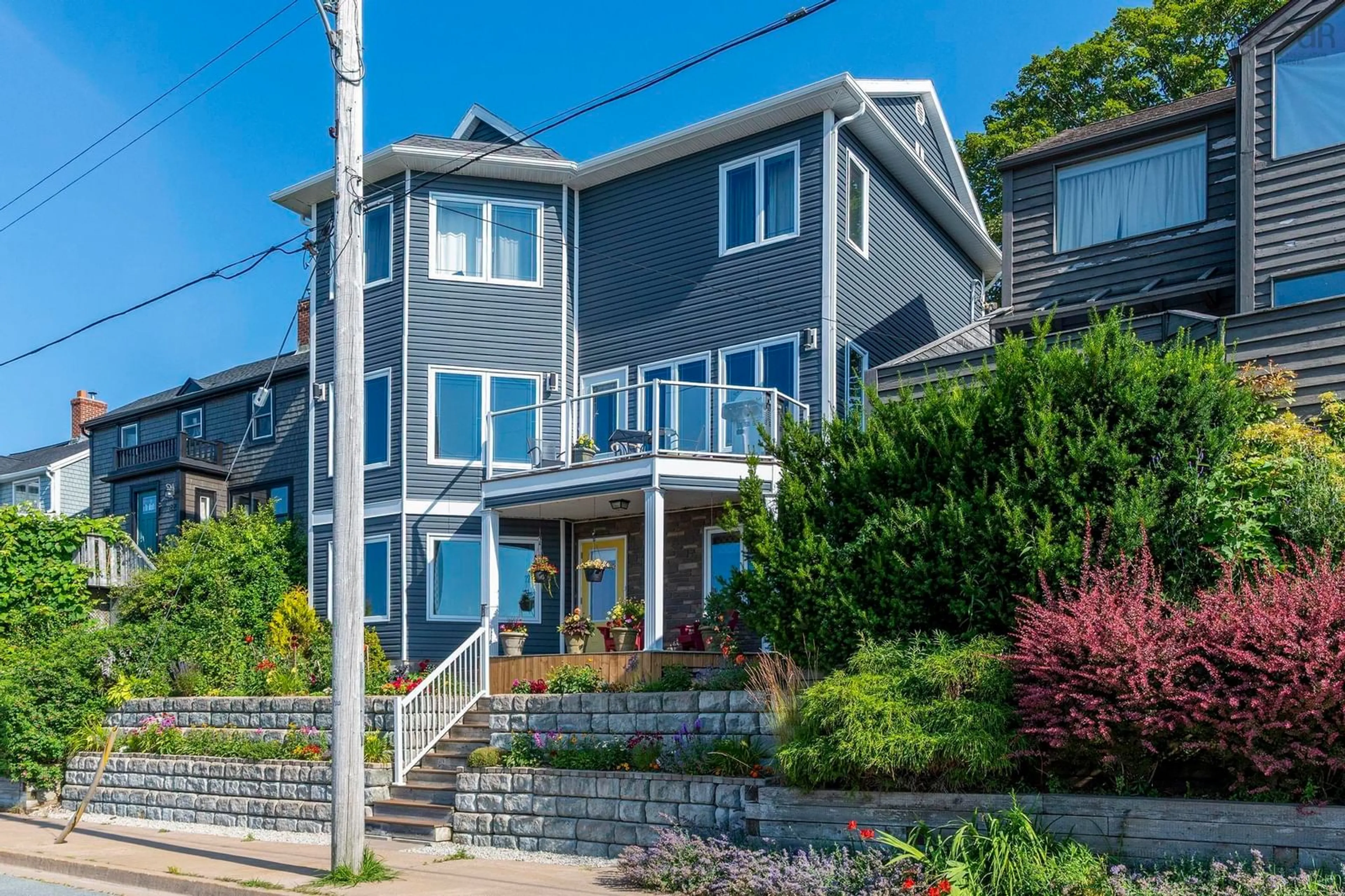 Home with vinyl exterior material, street for 60 Shore Rd, Dartmouth Nova Scotia B3A 1A3
