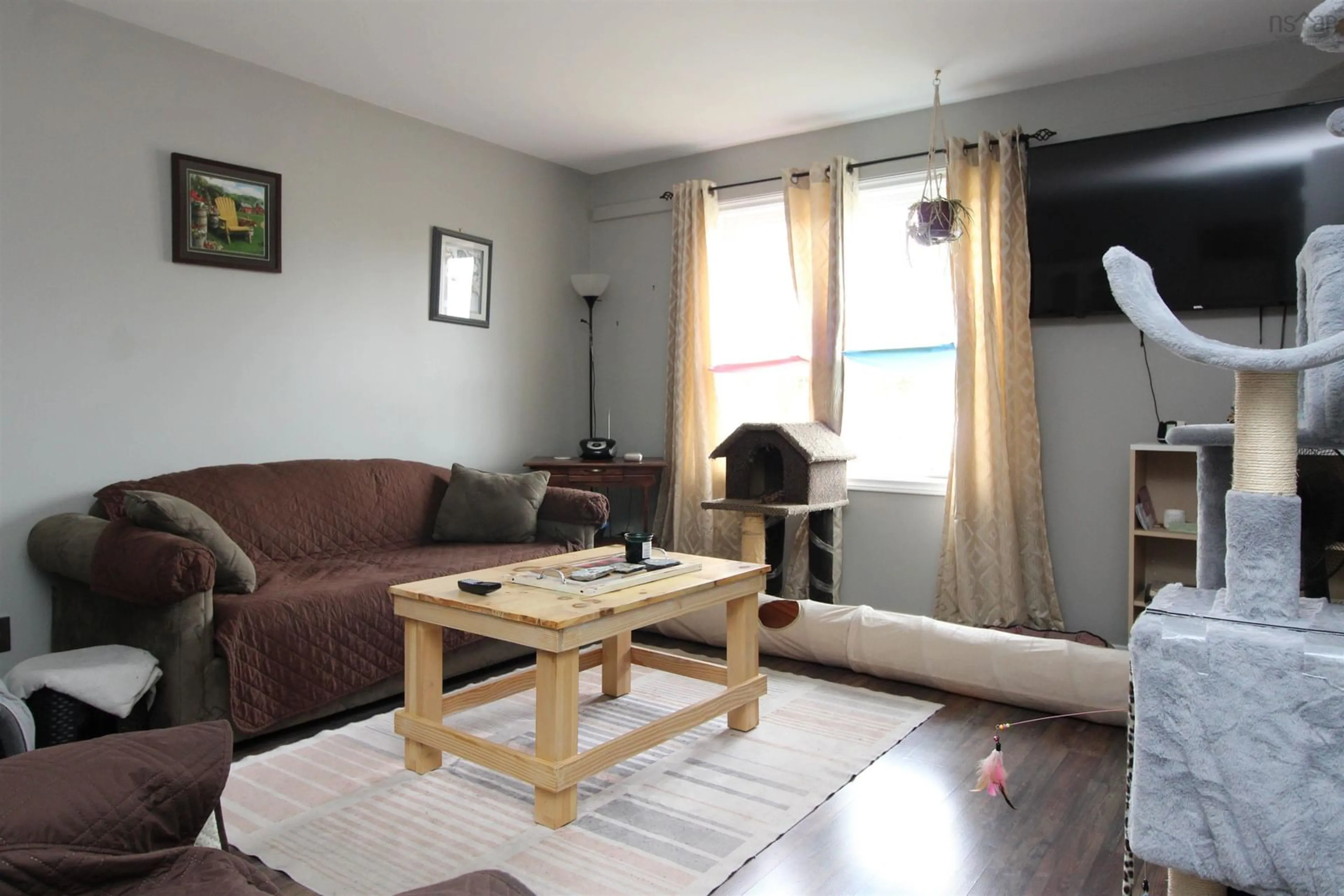 Living room with furniture, wood/laminate floor for 55 Bonaventure Pl, Debert Nova Scotia B0M 1G0