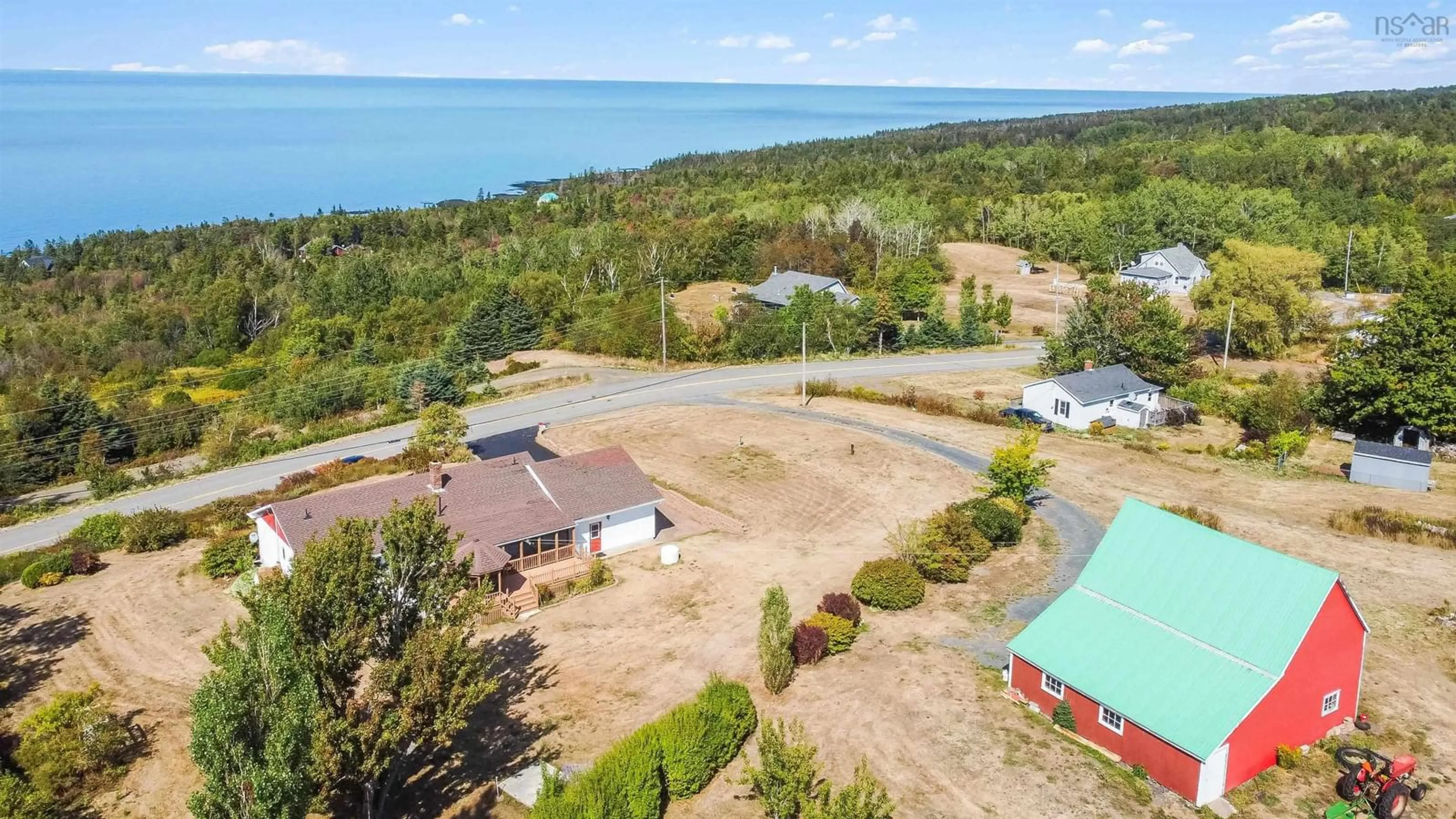A pic from outside/outdoor area/front of a property/back of a property/a pic from drone, water/lake/river/ocean view for 5234 Shore Rd, Parkers Cove Nova Scotia B0S 1A0