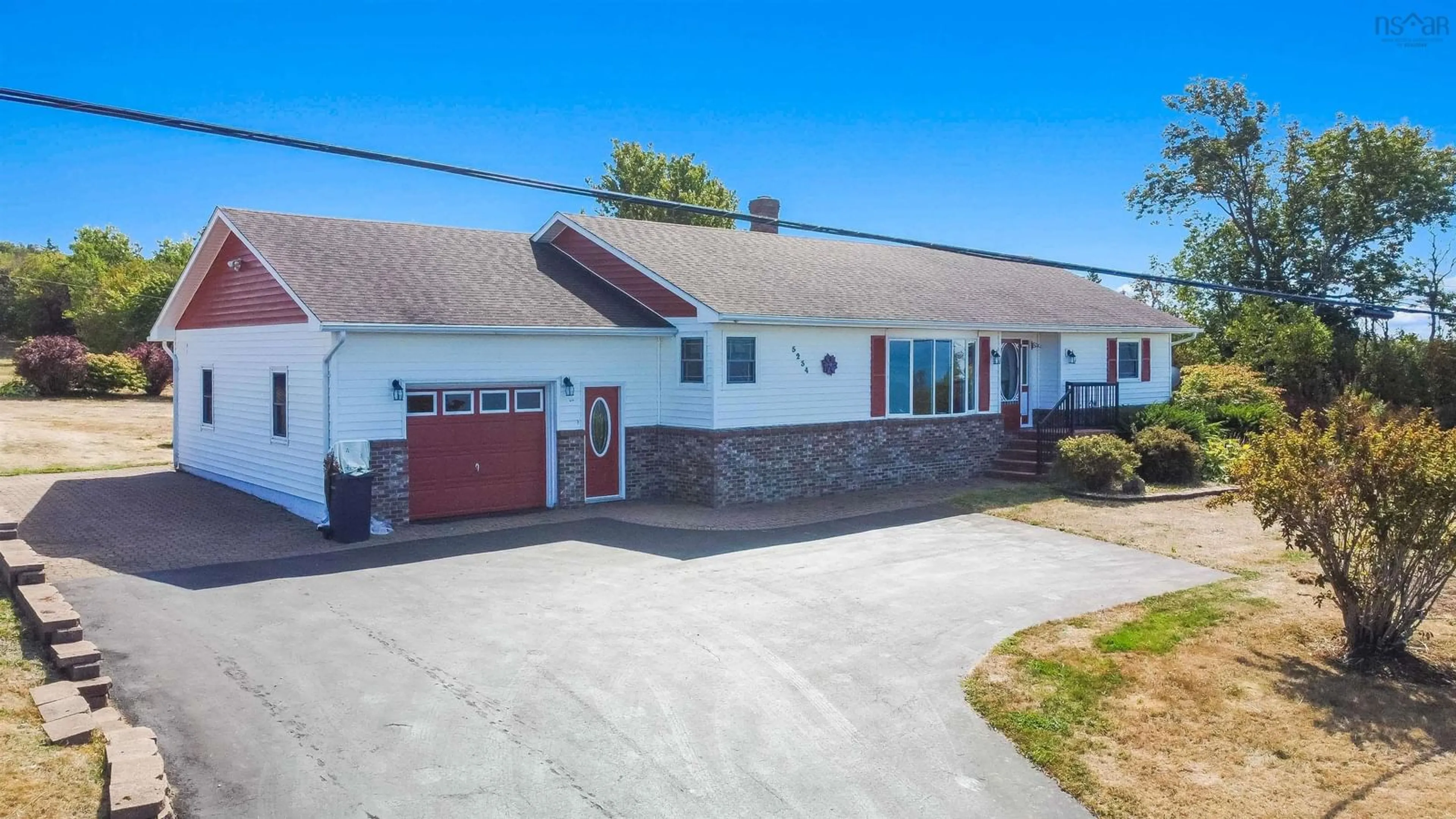 A pic from outside/outdoor area/front of a property/back of a property/a pic from drone, street for 5234 Shore Rd, Parkers Cove Nova Scotia B0S 1A0
