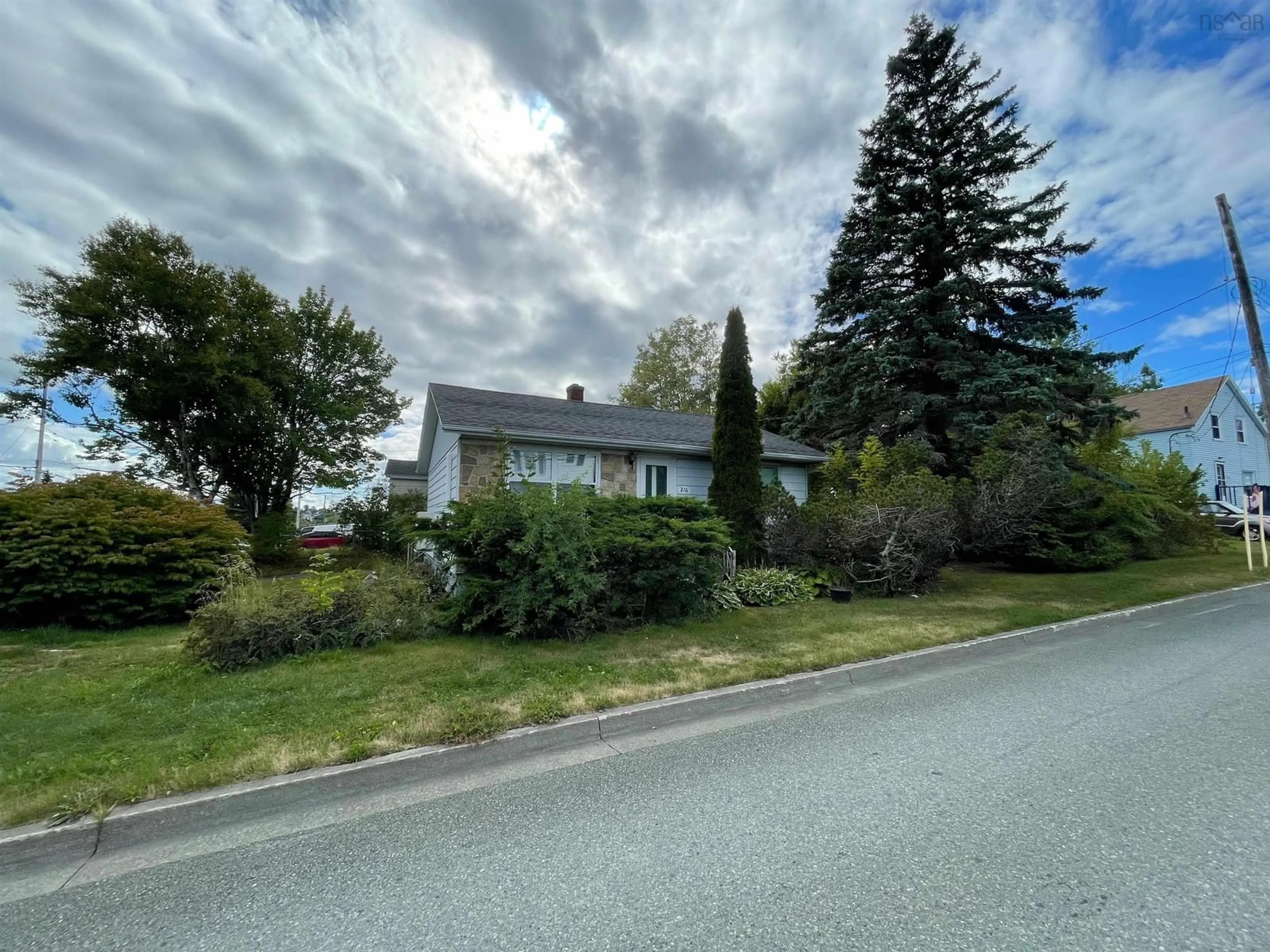 A pic from outside/outdoor area/front of a property/back of a property/a pic from drone, street for Ashby Road #216, Sydney Nova Scotia B1P 2S8