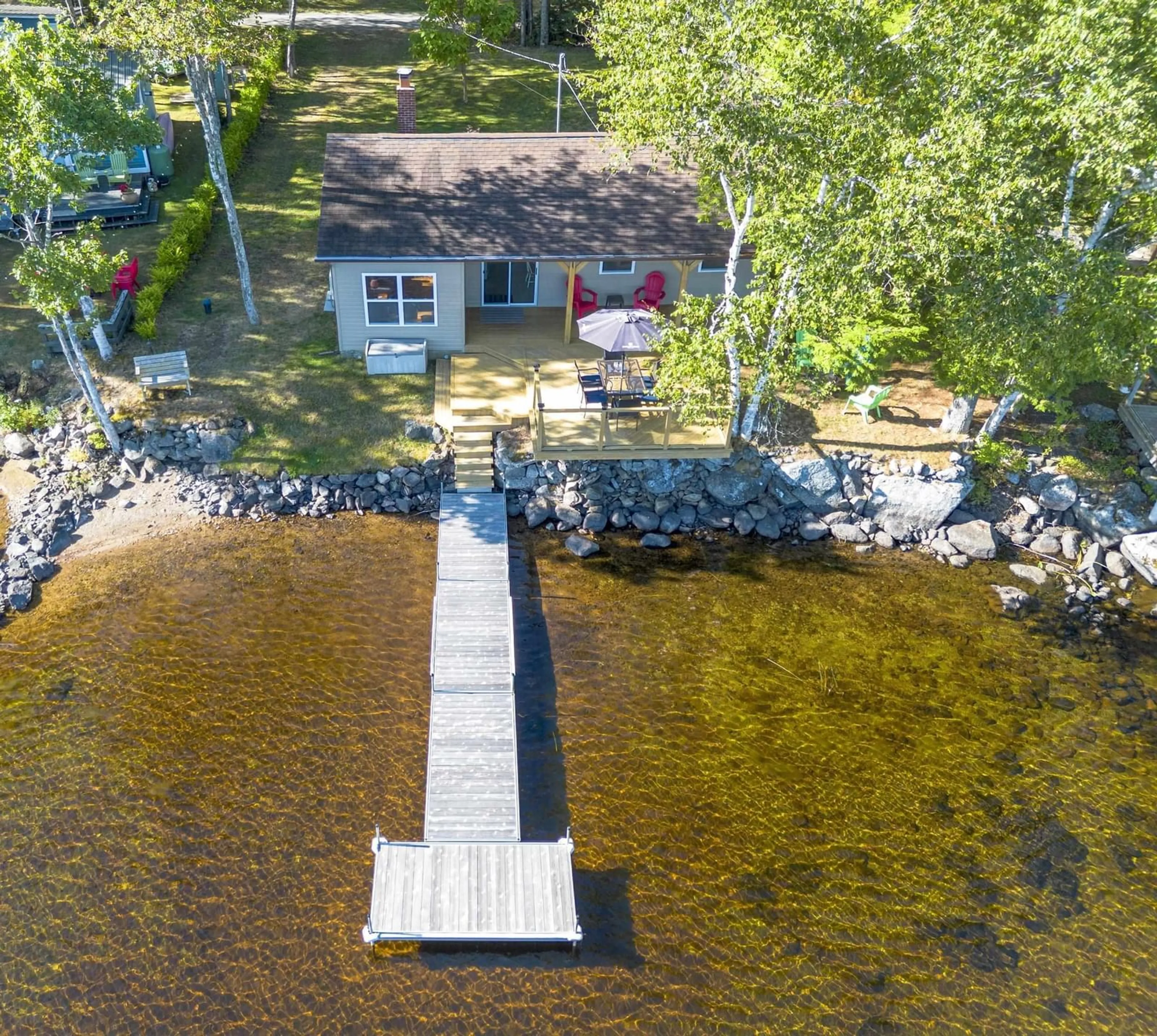 A pic from outside/outdoor area/front of a property/back of a property/a pic from drone, water/lake/river/ocean view for 43 Lake Paul Rd Rd, Lake Paul Nova Scotia B0P 1C0
